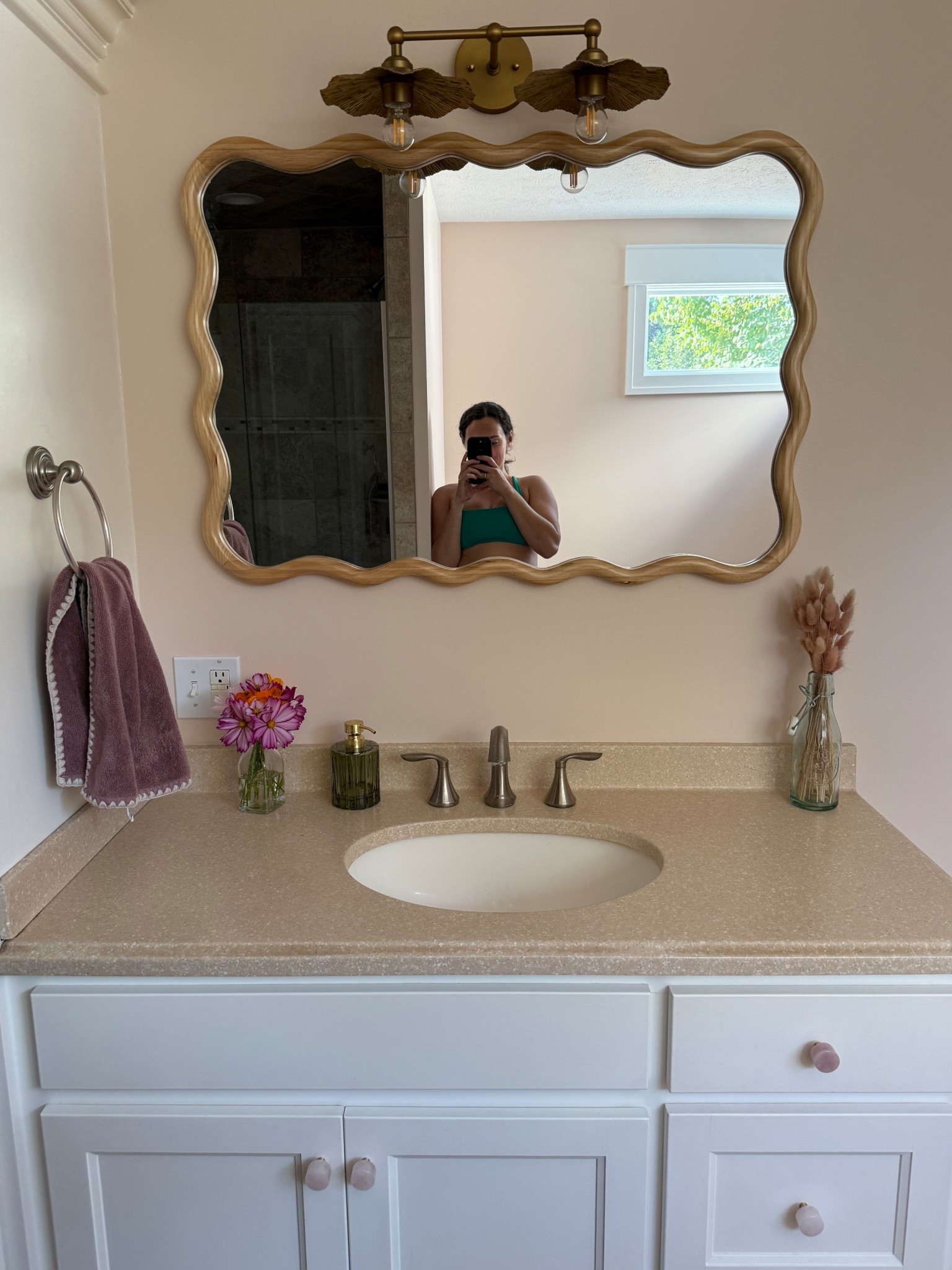 Finally found a bathroom mirror after 2 months! We tried 4 different mirrors in this space because there was a poor placed hole in the wall that we just could not find the right mirror to cover. Obsessed with the way it’s all coming together! 

#LTKFindsUnder50 #LTKHome #LTKSaleAlert
