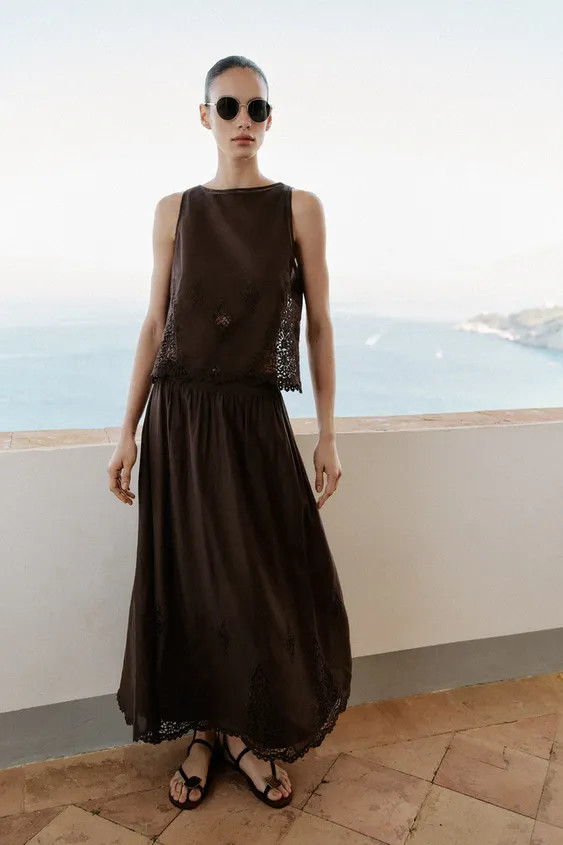 Round neck sleeveless top. Tonal lace inserts and embroidery. Slit at back hem. Back button closu... | Zara US