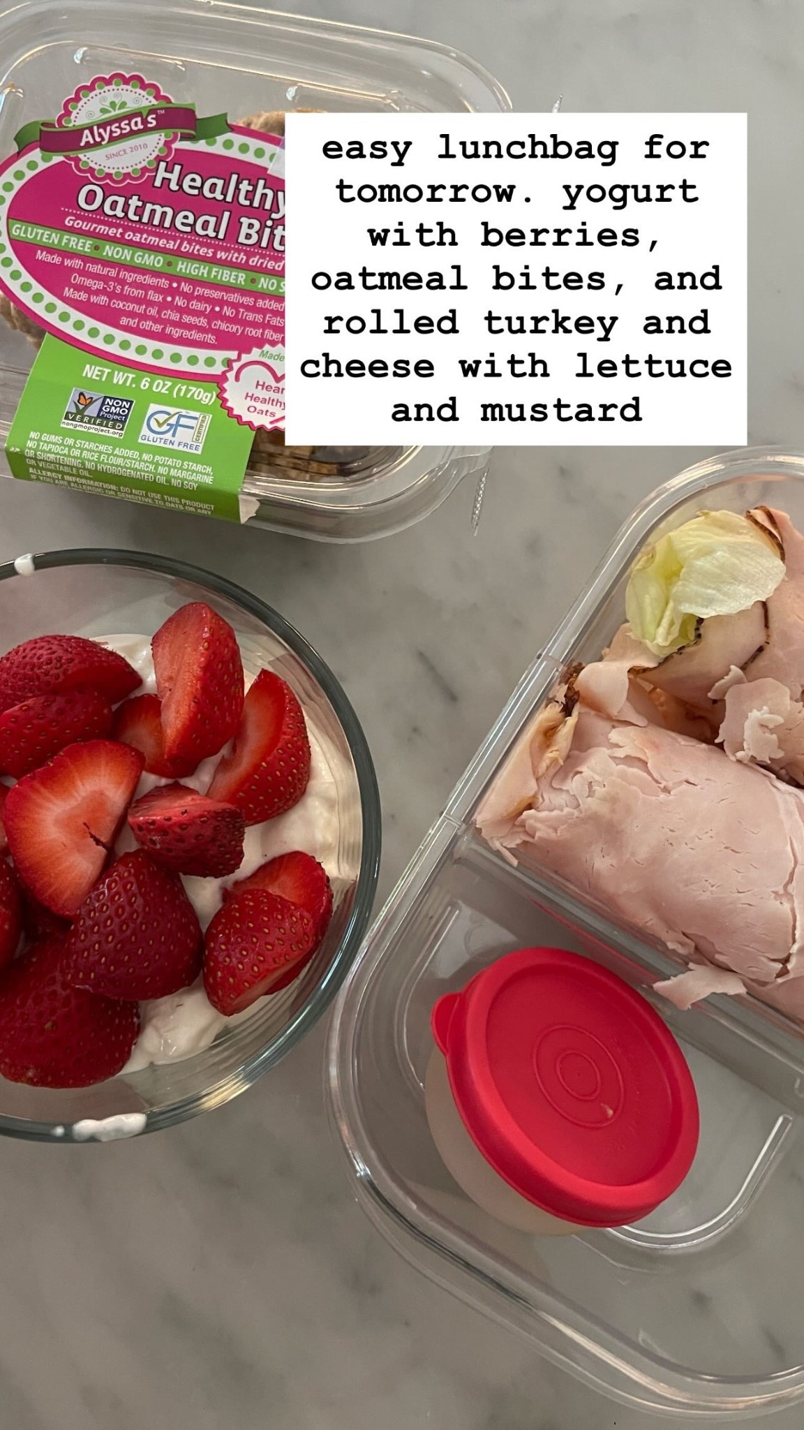 easy lunchbag for tomorrow. yogurt with berries, oatmeal bites, and rolled turkey and cheese with lettuce and mustard