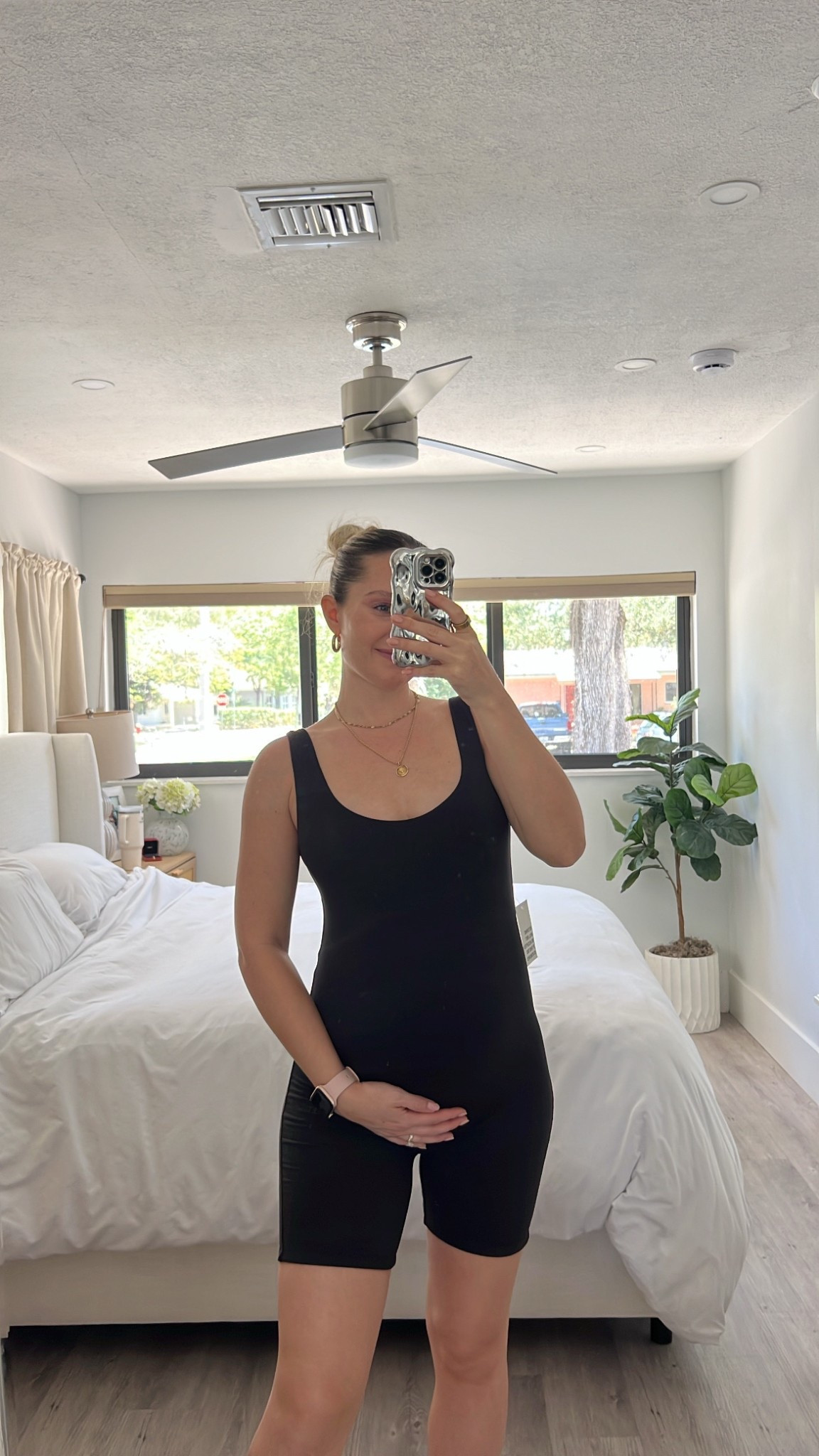 Wearing the Cindy maternity romper in size M 