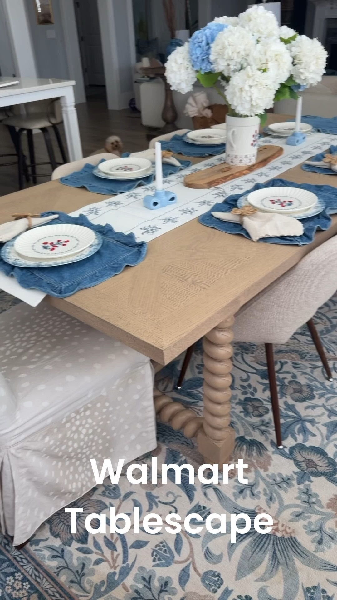 My Walmart Americana tablescape is officially ready for summer entertaining 🇺🇸💙 I cannot get over how pretty all of these new blue and white details are together! From the floral dinnerware to the denim-inspired placemats, bow candle holders, hydrangeas, and woven flower napkin rings… every single piece looks so much more high-end than the price tag. ✨

I wanted something that felt patriotic without being overly themed, and this turned out even prettier than I imagined for Memorial Day, Fourth of July, summer hosting, brunches, and backyard dinners. Walmart home decor has been SO good lately and these pieces mix perfectly with neutral decor too! 🤍

Everything is affordable, easy to style, and comes together for the cutest Americana summer tablescape. Linking all my Walmart finds because I know these are going to go FAST 👏🏼🇺🇸

#WalmartHome #AmericanaDecor #TablescapeDecor #SummerTablescape #PatrioticDecor #FourthOfJulyDecor #MemorialDayDecor #BlueAndWhiteDecor #WalmartFinds #SummerHomeDecor #DiningRoomDecor #AffordableHomeDecor #PatrioticTablescape #CoastalDecor #HydrangeaDecor #EntertainingAtHome #WalmartDecor #SummerHosting

#LTKHome #LTKSeasonal