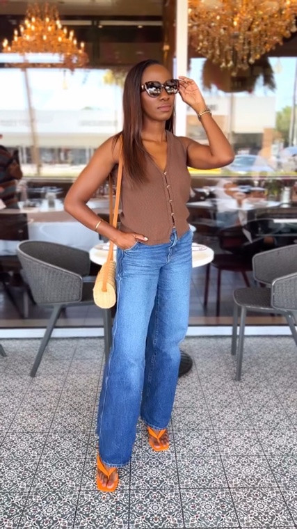 This brown top is timeless and true to size.

#LTKSeasonal #LTKgrwm #LTKootd