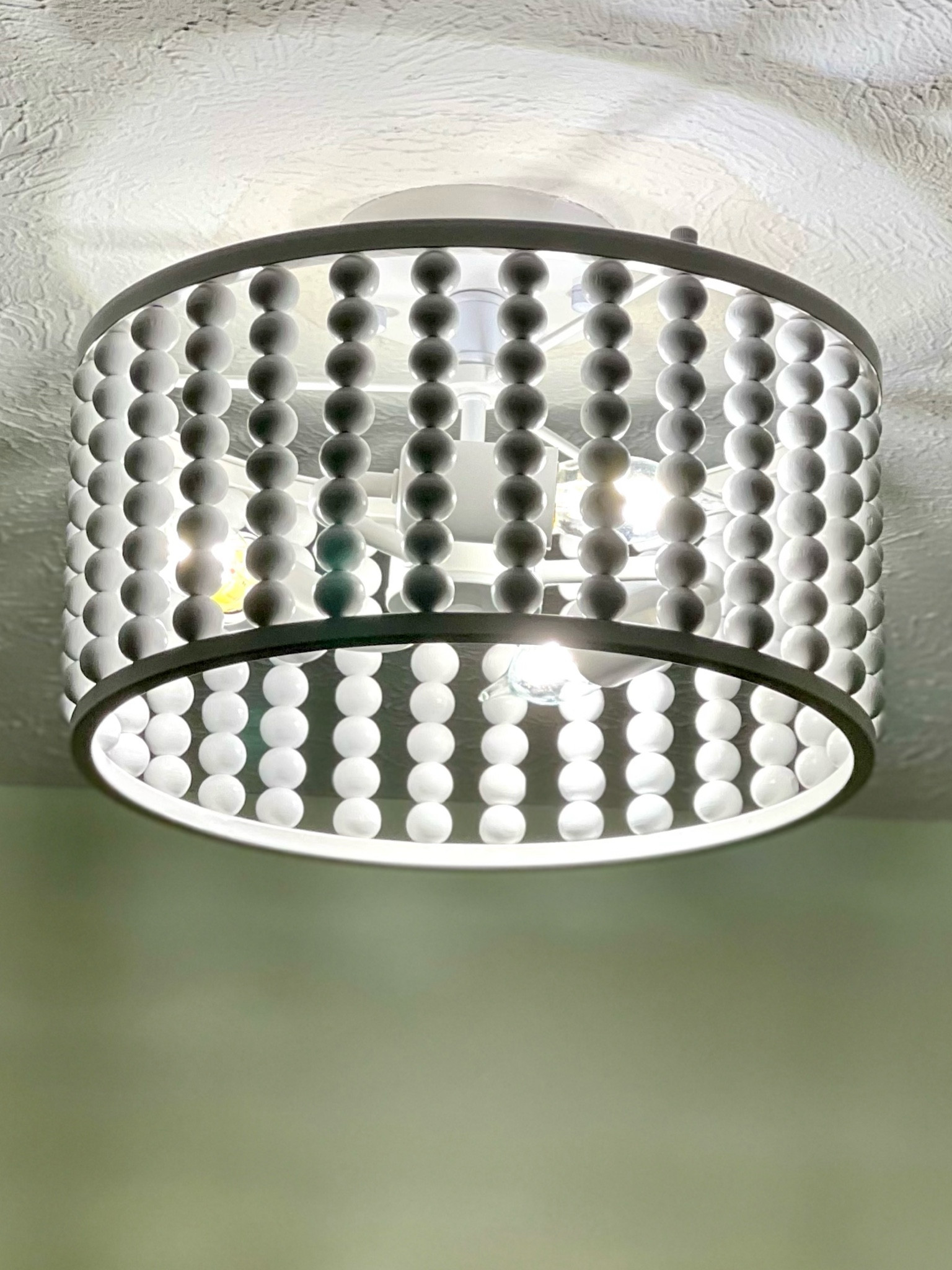White semi-flush beaded light fixtures. Amazon lighting.

#LTKfindsunder50 #LTKhome