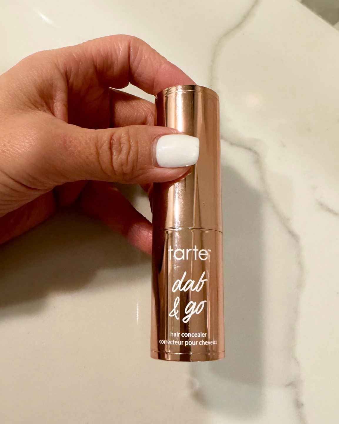 Tarte Dab & go 
This is what I use to conceal my grey hair in-between coloring my hair. 
 Color: black-brown 

#LTKBeauty #LTKOver40