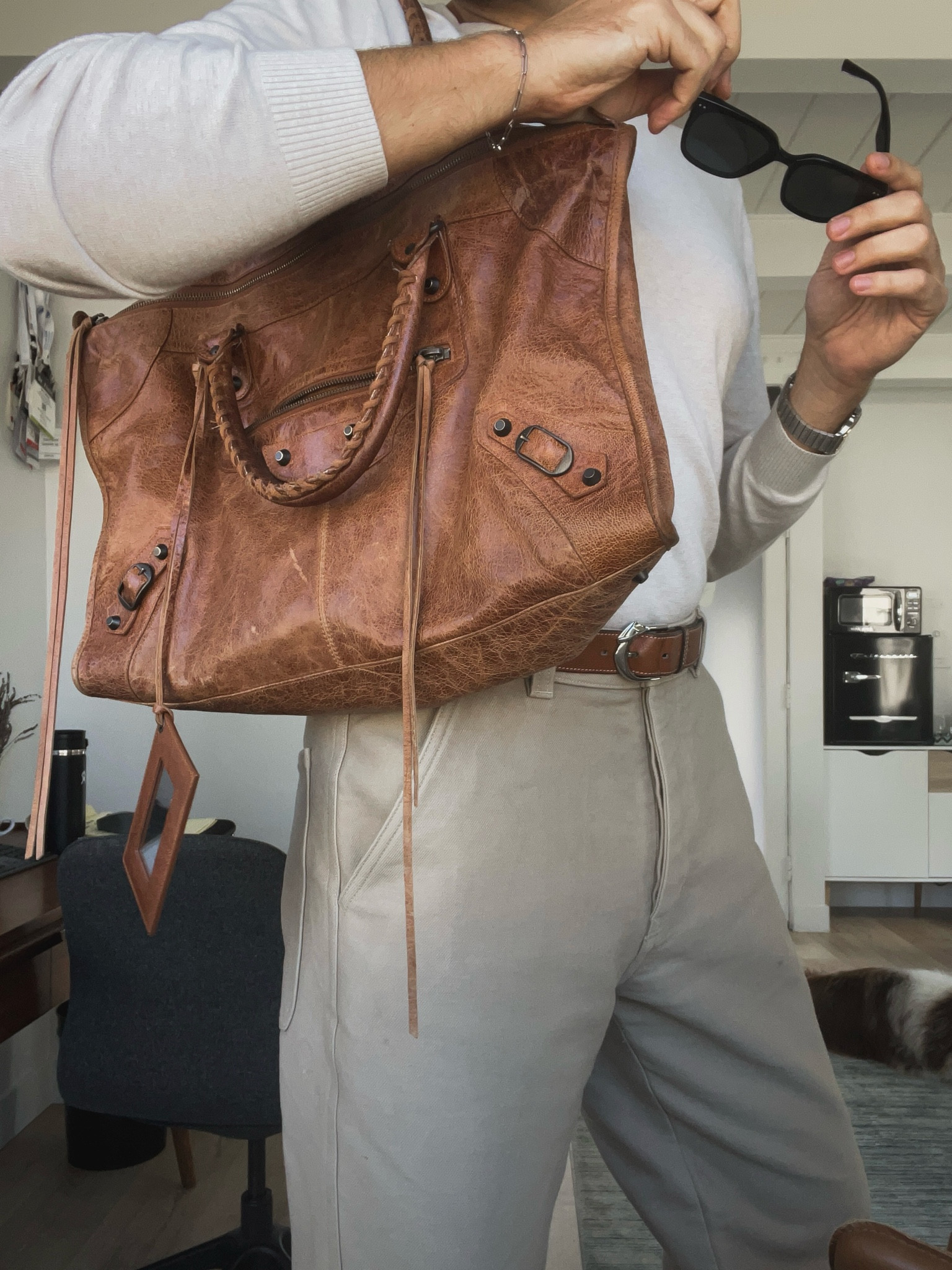 Man carrying a brown Balenciaga Work Bag from 2009 


#LTKItBag #LTKMens #LTKFindsUnder50