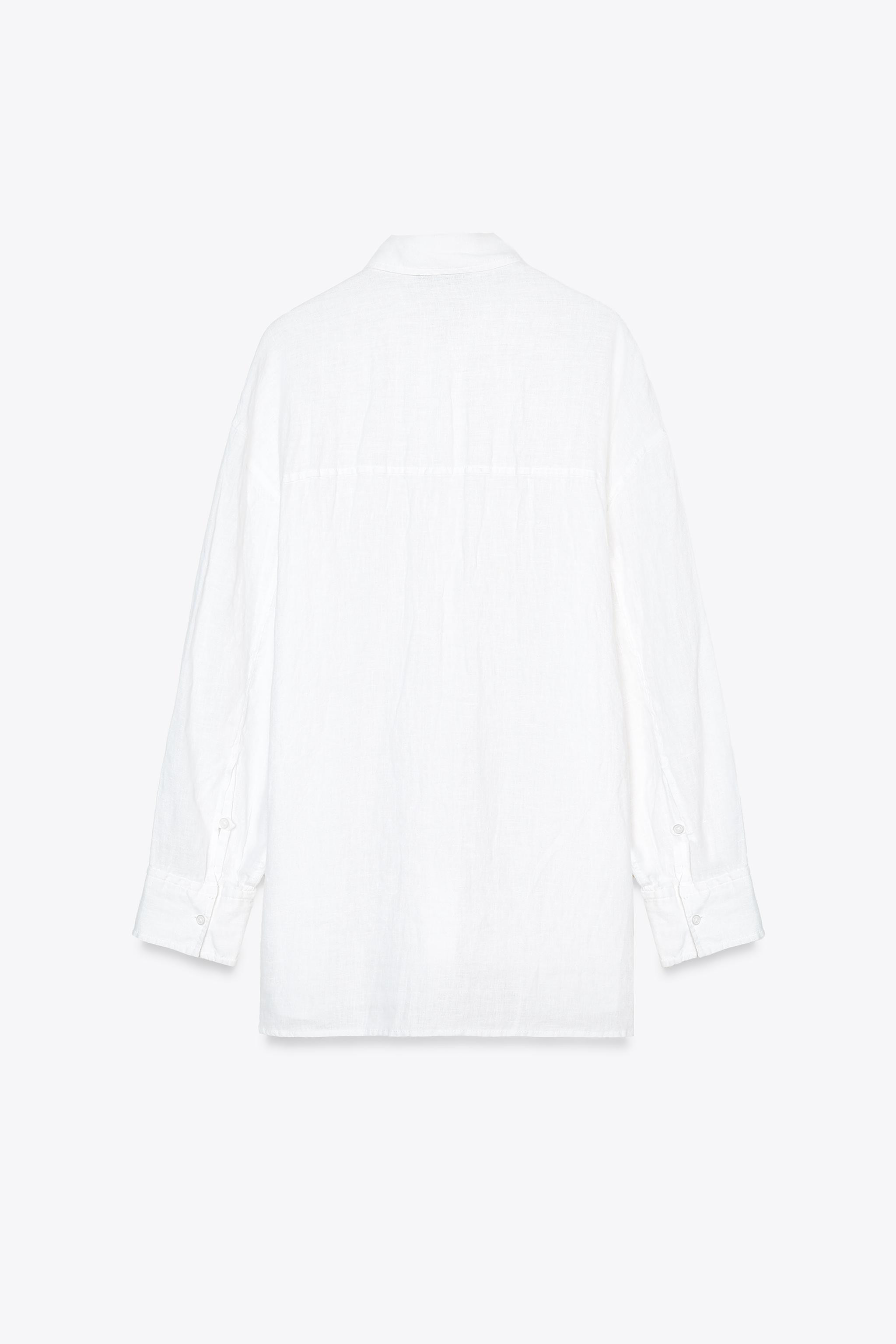 Shirt made of 100% linen. Lapel collar and long sleeves with buttoned cuffs and dropped shoulders... | Zara US