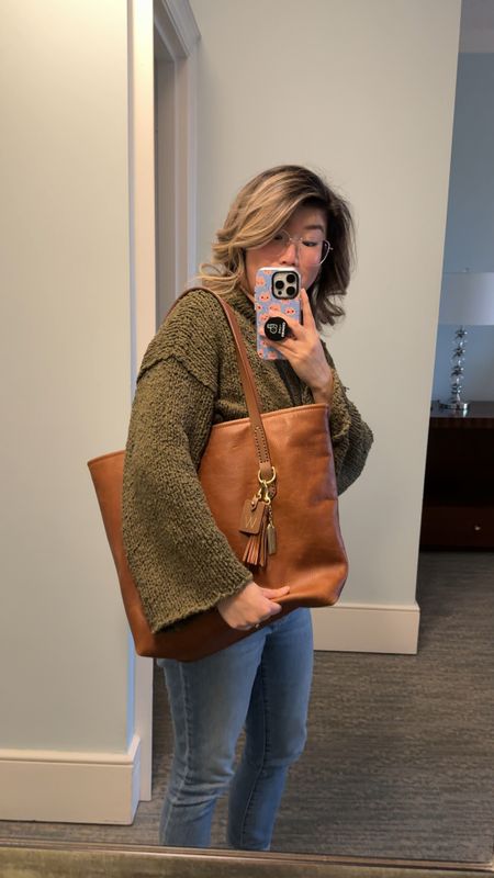 My leather work tote is on sale for almost $150 dollars! I love this Fount leather bag so much. It’s the perfect handle to have over the shoulder. It holds my MacBook Pro with room to spare and it also can hold 16 bricks! 🧱 it’s why I picked it. Durable, classic and beautiful. The leather is patinas beautifully! 

#LTKSpringSale #LTKsalealert #LTKVideo