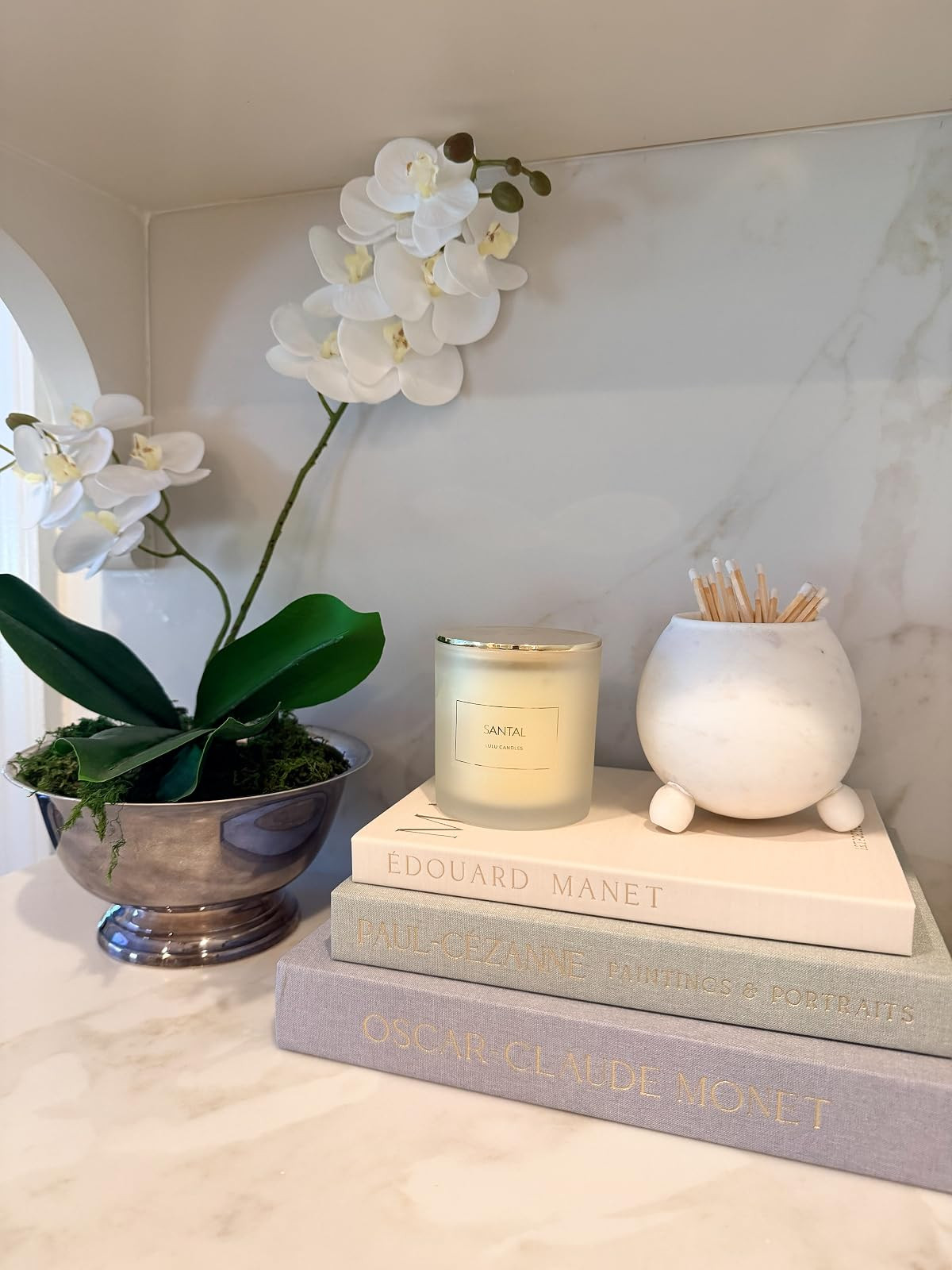 Elevate your home decor with these beautiful artificial flowers and decorative books. Perfect for any space! This Santal/sandalwood candle smells INCREDIBLE

#AmazomHome #AmazonFinds #TheSouthernSource 

 #LTKdayinmylife #LTKstorytime #LTKHome
