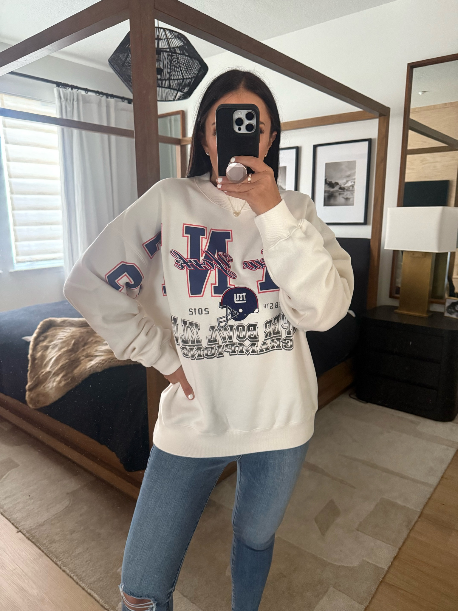 New York Giants Graphic Crew Sweatshirt wearing size medium. Mid Rise Dark Wash Ripped Hem Skinny - wearing size 4. High Waisted Light Wash FlexX Ripped Skinny Jeans wearing size small. 