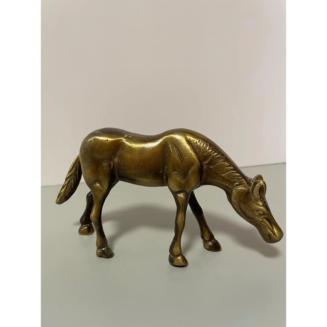 A vintage brass horse figurine capturing a horse in a grazing pose. This detailed statue showcase... | Etsy (US)