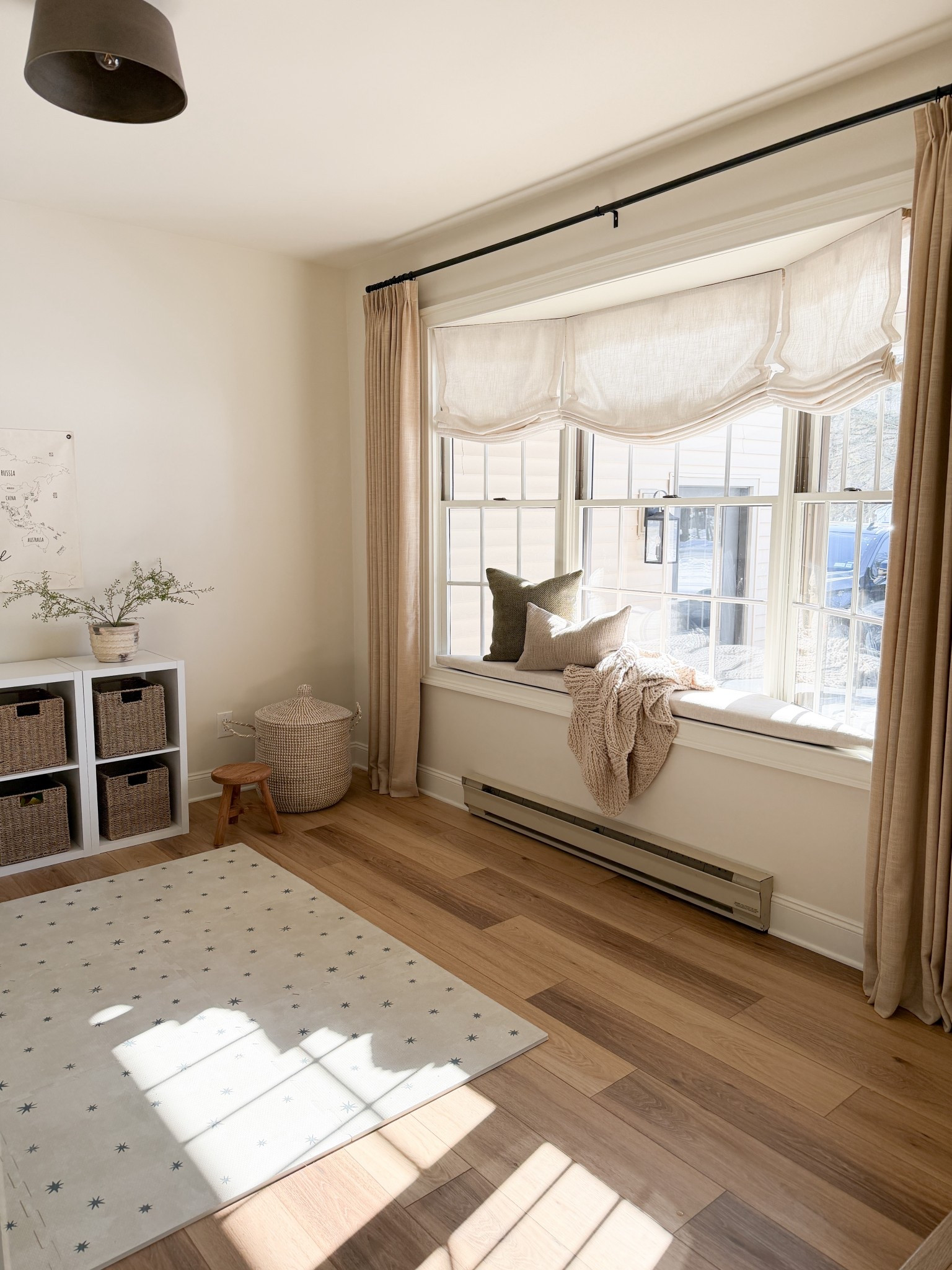 Neutral playroom, bay window, window seat, custom affordable curtains and blinds, neutral curtains 

#LTKKids #LTKHome #LTKU