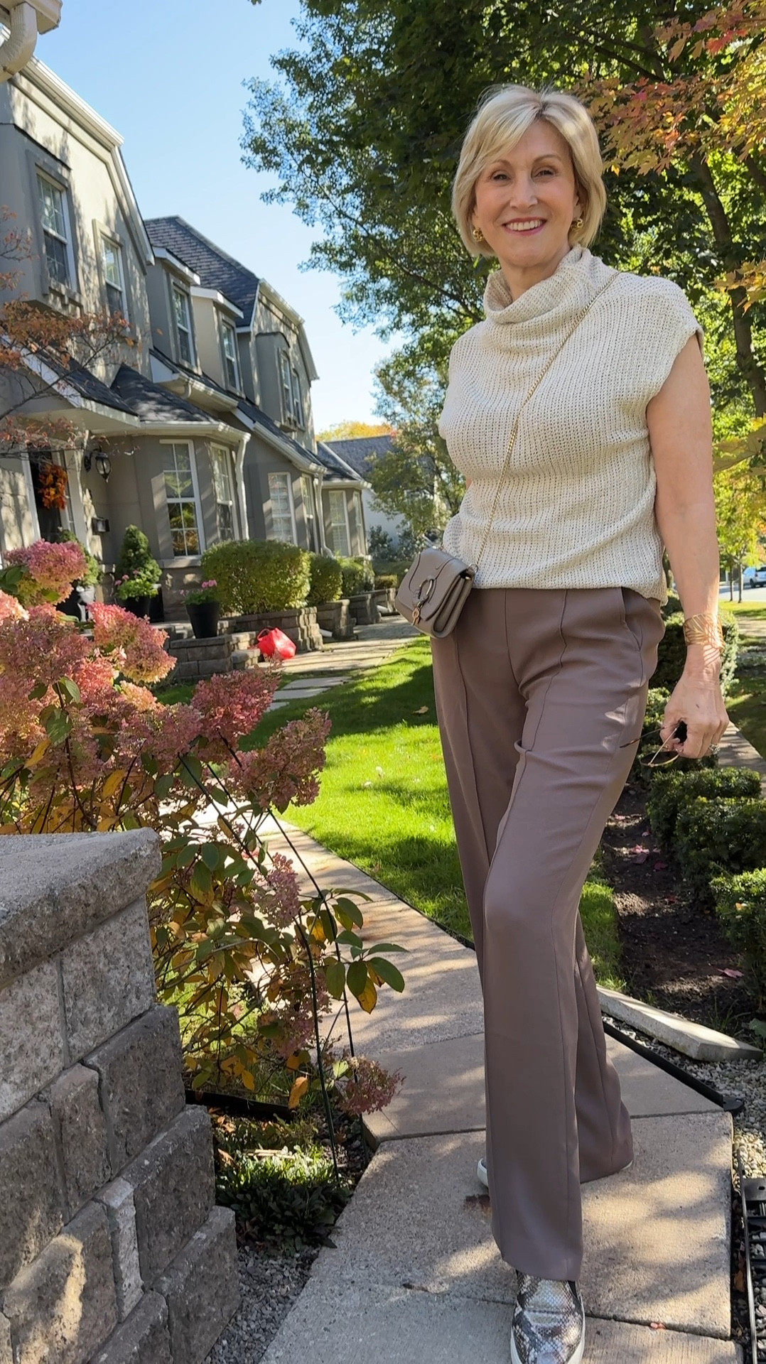 Here’s a transitional look that is polished and modern. I love a short sleeve knitted top and this one from @gibsonlook can be worn from Spring to summer and from summer into Fall. I’m wearing it with these relaxed mushroom colored trousers from @spanx and added a matching colored crossbody bag. 
🤍Scroll down to shop & follow for more!


#LTKVideo #LTKOver40 #LTKSeasonal
