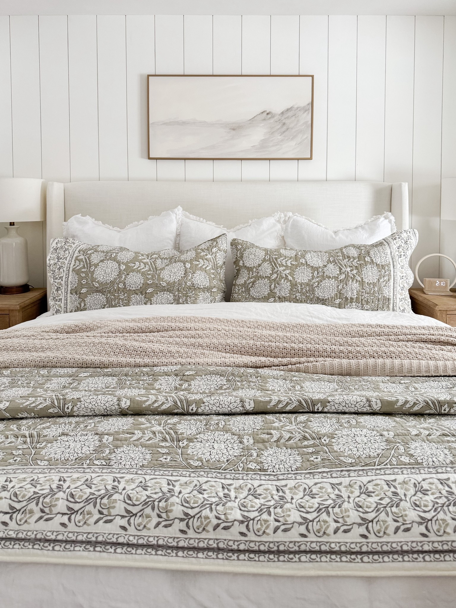 Amazon Neutral coastal bedroom with gingham bedding, layered throw blankets, textured knit coverlet, and soft patterned pillows. Light wood nightstands and white table lamps create a calm, layered spring bedroom look. 
Spring bedding, neutral bedroom decor, layered bedding, spring bedding, coastal bedroom, throw blanket, knit coverlet, patterned pillows, light wood nightstands, white table lamps, cozy bedroom, serene bedroom style, sherri calnan home

#LTKHome