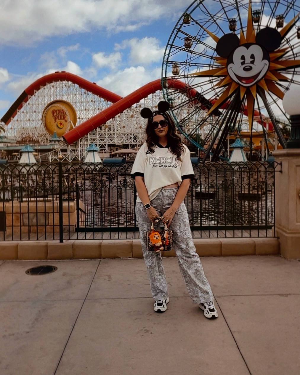 Disney days will forever be my favorite days. Did I mention these are still my favorite pants. So comfortable! They do run a little big so I recommend sizing down. 
Bag is @magicmousezone on IG. Use code MMZREPJENNY to save

#LTKdayinmylife #LTKootd #LTKmomlife