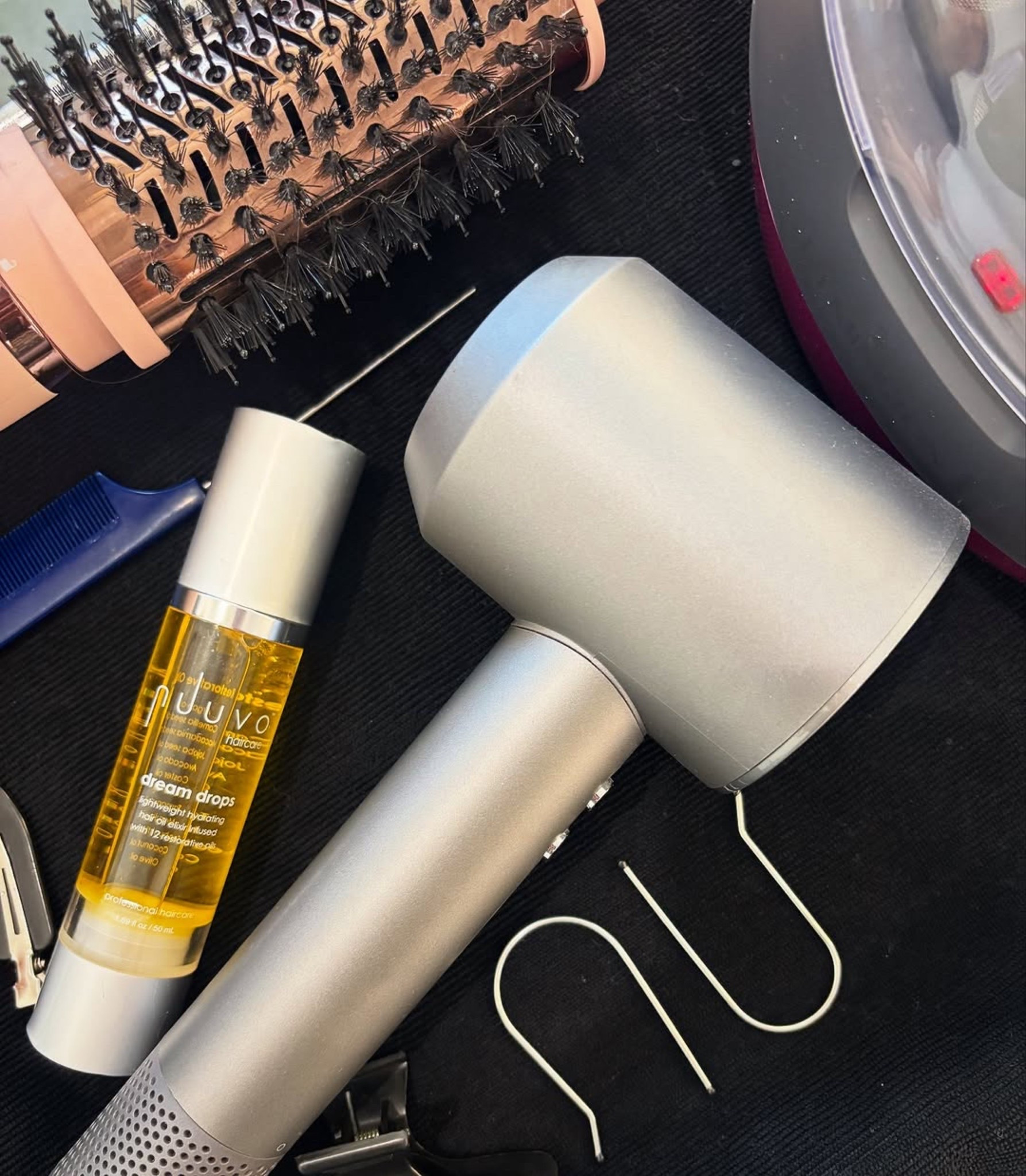 Tools of the trade ✨
These are the products I reach for daily in the salon and on my own hair and honestly can’t live without.

💧 Nuuvo Dream Drops — my holy grail for healthy, shiny, frizz-free hair.
💨 Blow Dryer & Round Brush in One — cuts my styling time in half while giving me that smooth, bouncy finish.

Linked for you so you can add them to your toolkit too 👇

#LTKNYFW #LTKFindsUnder50 #LTKBeauty