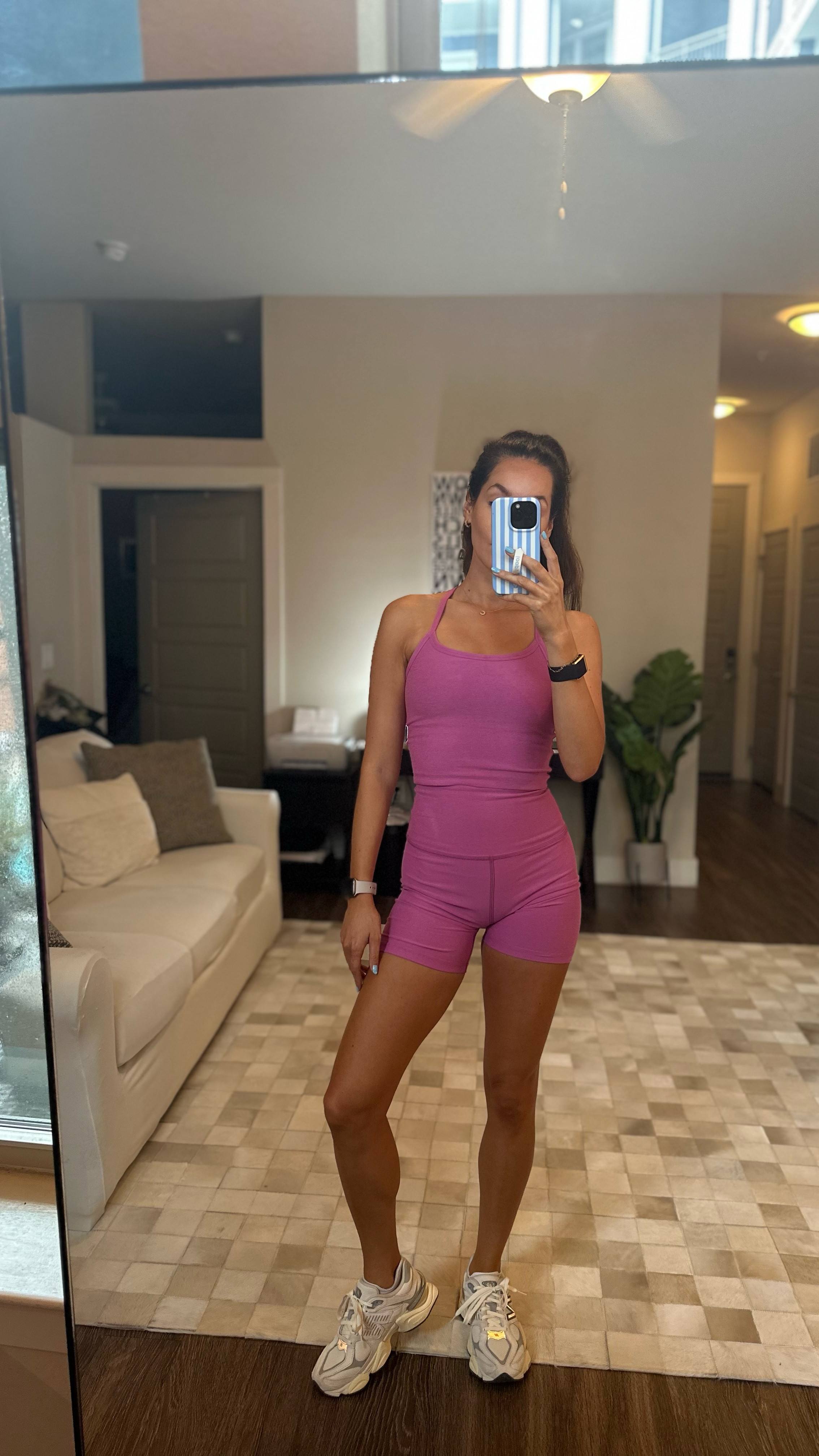 Beyond Yoga tank (I’m wearing a size S)
Beyond Yoga shorts (I’m wearing a size M) 
New Balance shoes (TTS)
Loopy case (code carolinelawley)

Athleisure
Yoga
Workout 

#LTKActive