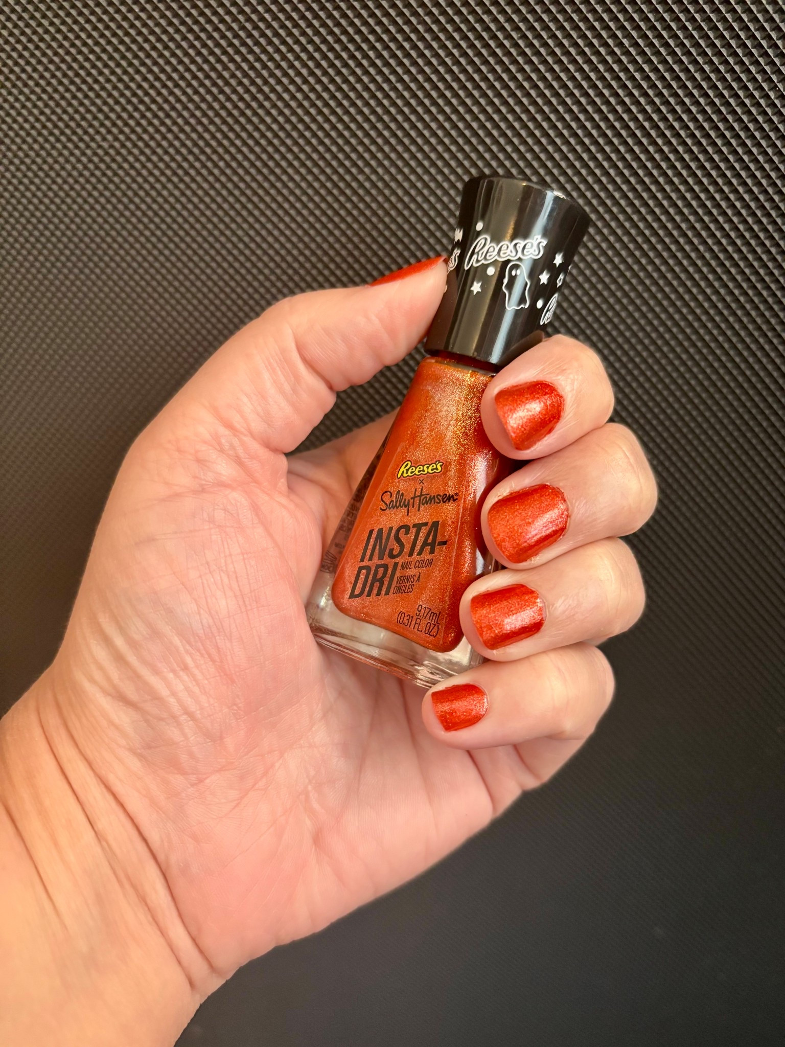Sally Hansen glitter orange nail polish 
Reese’s nail polish
Halloween nails
Halloween nail polish
DIY mani
Fall nails
Bengals nails
Swiftie nails
Life of a showgirl nails
TS12 nails

#LTKSeasonal #LTKBeauty #LTKStyleTip