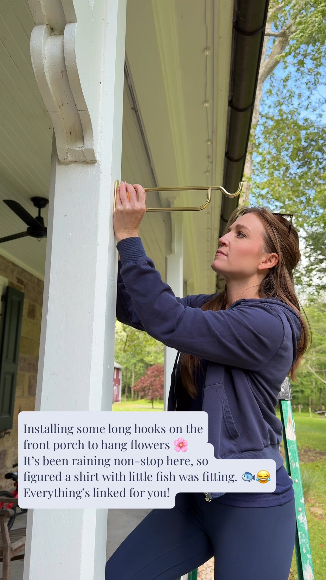 Rainy days call for fishy shirts 🐟🌧️ Finally got this long hook up on the porch to hang some flowers — small updates that make a big difference! Everything’s linked if you’re sprucing up your outdoor space too 🌿🪴 #FrontPorchMakeover #OutdoorDecor #PorchGoals 

#LTKFindsUnder50 #LTKU #LTKHome
