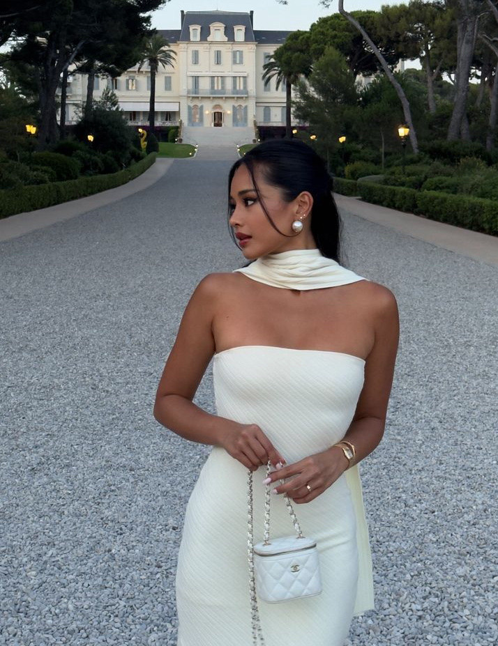 Ivory strapless  midi dress
Ivory shawl/scarf
White Chanel vanity bag 
Bug silver/Pearl earrings 
Gold bracelet 

#LTKStyleTip #LTKParties #LTKWedding