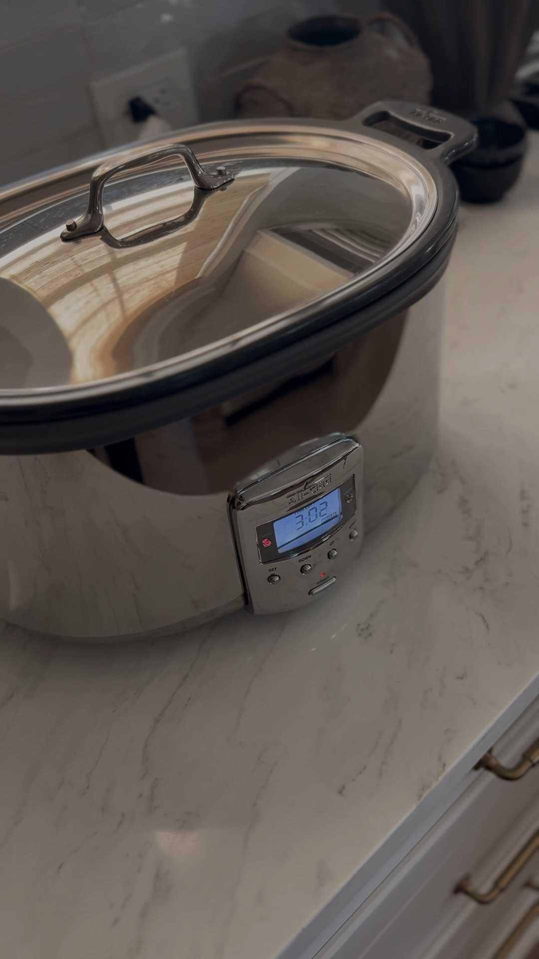 slow cooker with cast iron insert to brown meat on stovetop 