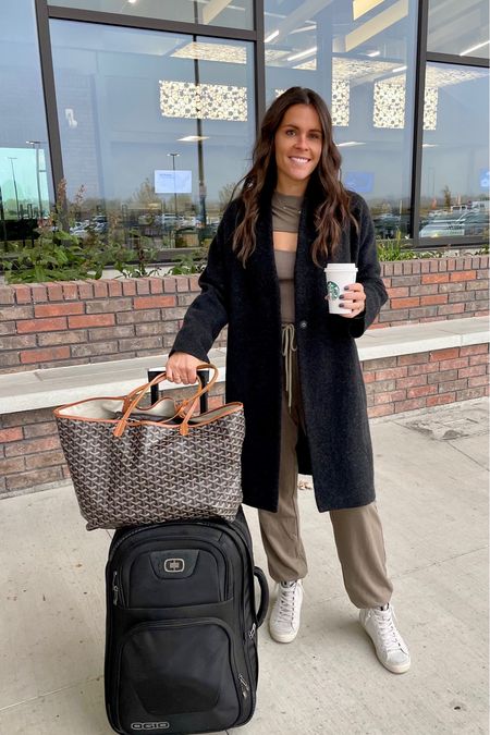 Travel style. Comfortable matching set and sneakers from Vici Dolls, cardigan jacket from Vince. 

Airport style, good luggage 

#LTKitbag #LTKtravel #LTKSeasonal