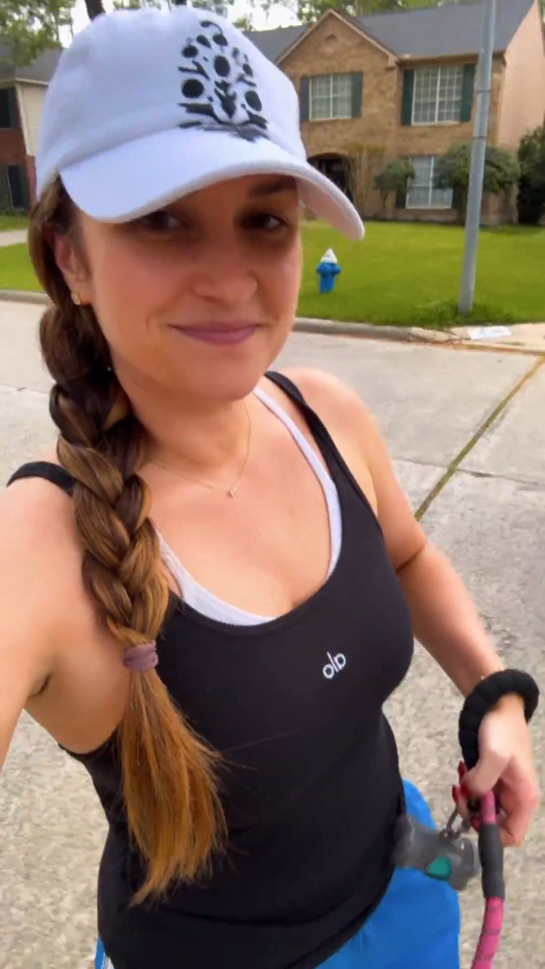 Taking our sweet girl on a walk and sharing today’s OOTD! Everything fits TTS! Wearing a medium in the tank and pants. 

#LTKootd #LTKActive #LTKdayinmylife