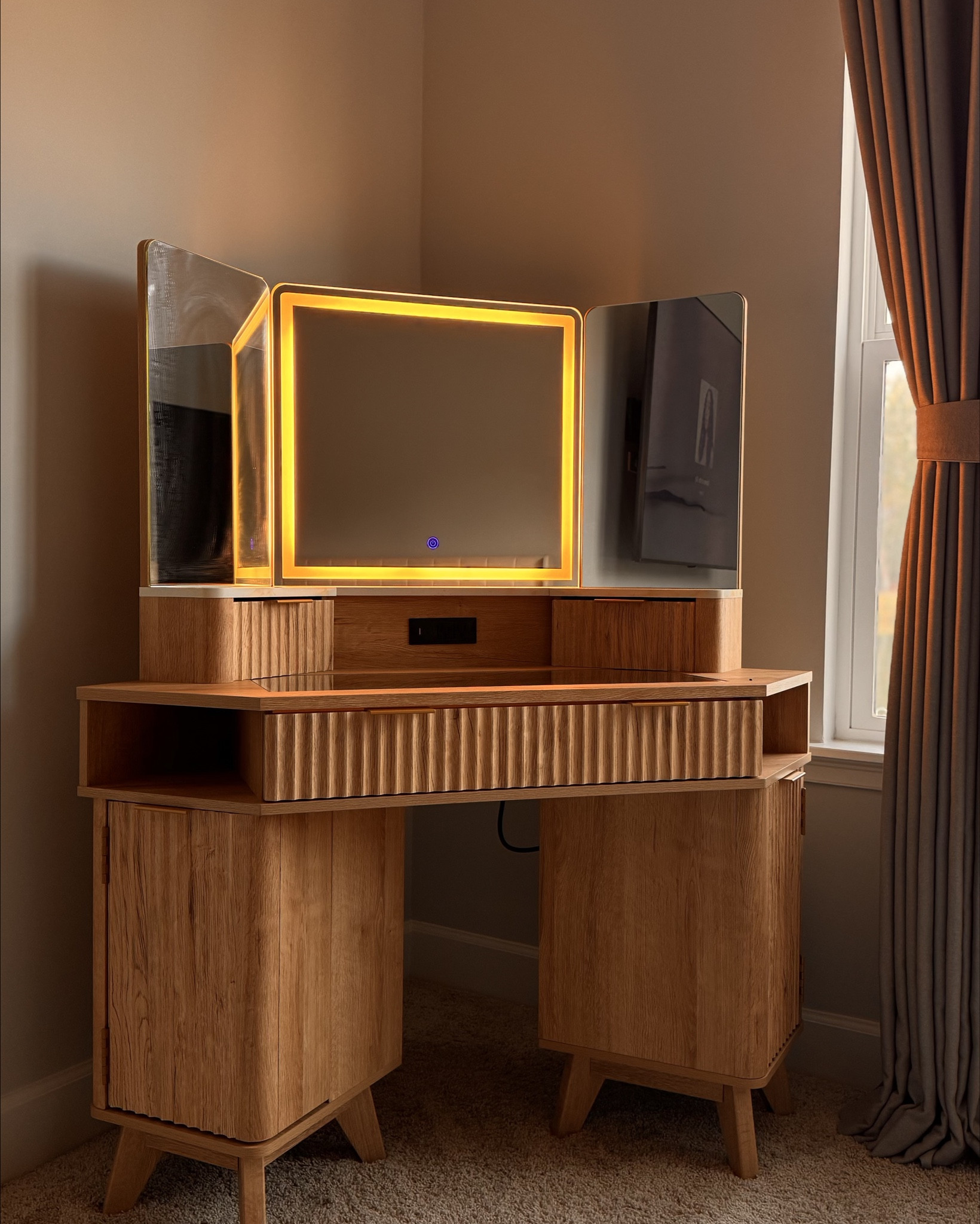 I found the cutest corner vanity for my room. It has enough cabinet and drawer space as well as hidden compartments. It also comes with a light built into the mirror that has different settings. 

#LTKHome