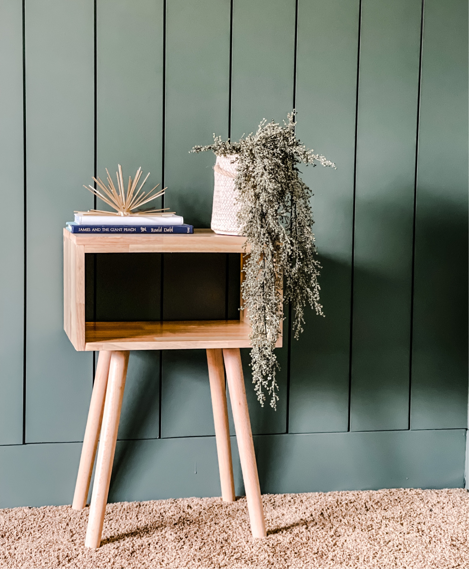 Mid-Century Modern night stand I’m using in my guest room. It’s a pain to screw together, but it’s made from real wood and a cheap option!

#LTKunder50 #LTKhome #LTKFind