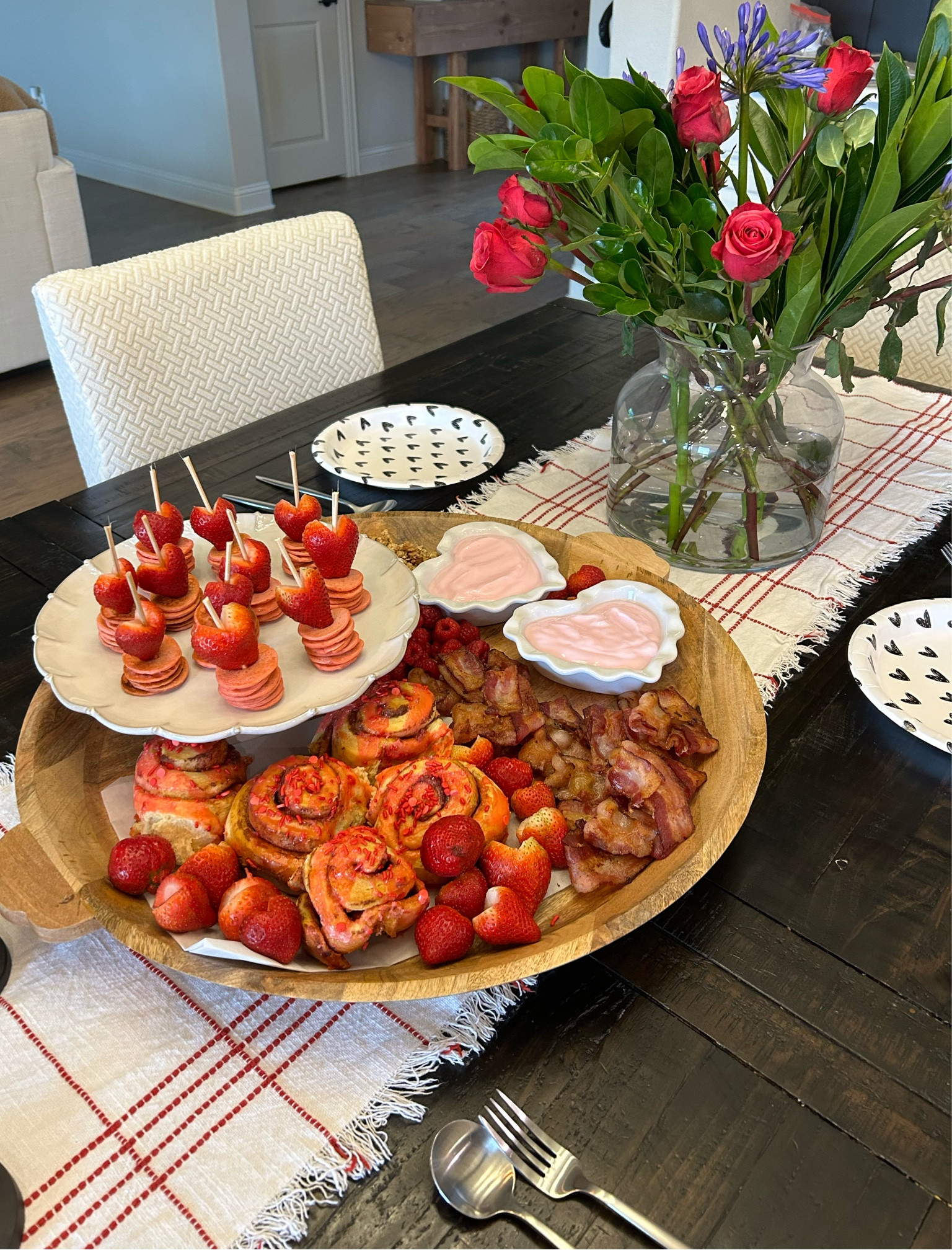 VALENTINES BRUNCH
Each year I make a Valentine’s themed brunch spread for my family, of course we do so on a weekend. 
I love to keep with in theme— pink, red and hearts. 

This year I made pink Cupid pancake stacks, pink frosted cinnamon rolls, heart bacon, red fruits (berries cut in heart shape), and filled heart ceramic dishes with yogurt. 
This always seems like a lot of food but somehow my family eats almost all of it. 😝

#valentines #valentinebrunch #pinkbrunch #pinkandredfood #heartfoods #cupid #galentinesday #valentinesdaybrunch #valentinesday #momlife #dfwmoms #dfwmomblogger #dfwcreatives #dfwinfluencer #ltk #ltkkids #ltkfamily #ltkholiday #ltkvalentinesday #charcuterie #charcuterieboard #valentinecharcuterie #valentinecharcuterieboard #targetstyle 

#LTKfamily #LTKparties #LTKhome