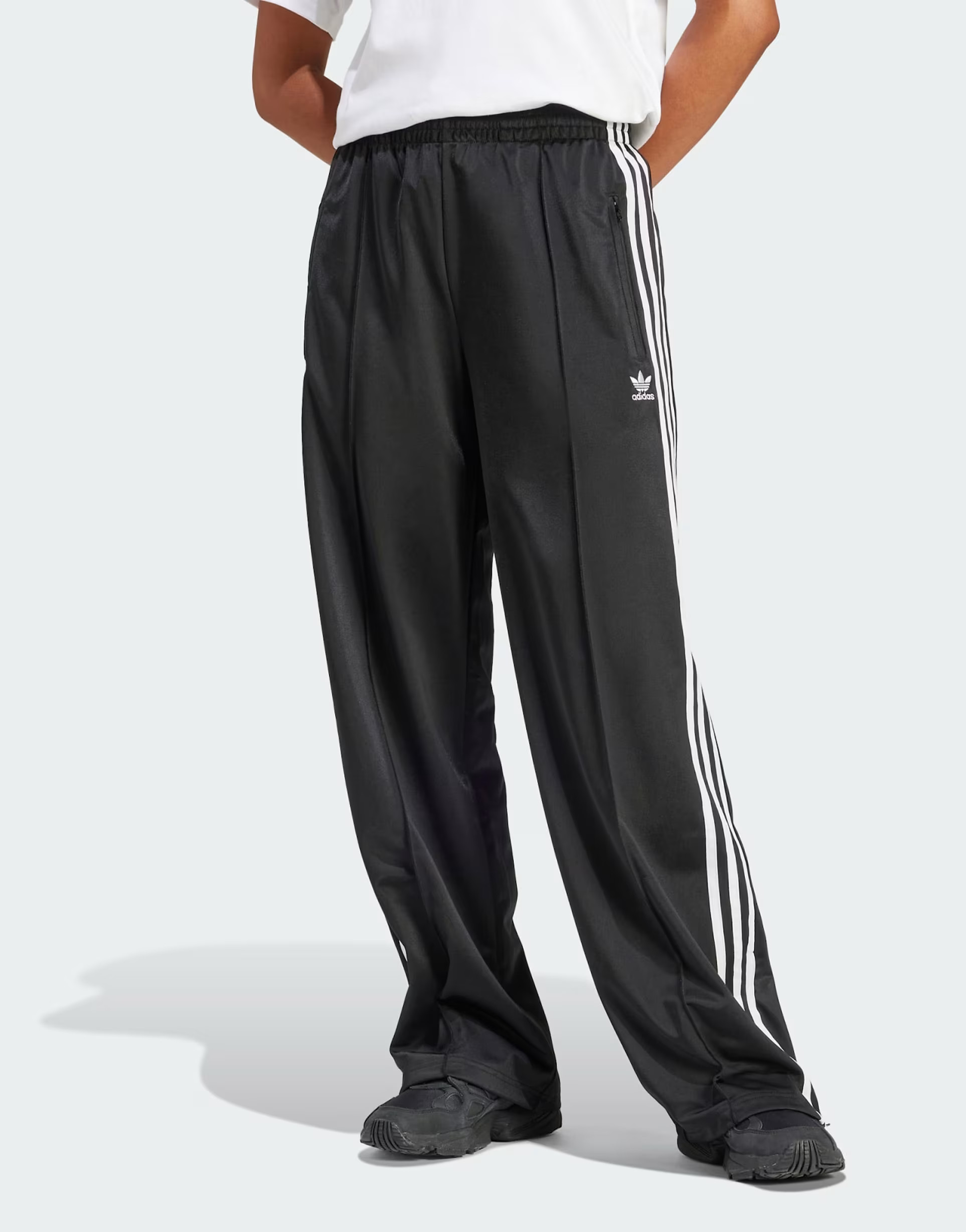 adidas Originals Firebird loose track pants in black | ASOS (Global)