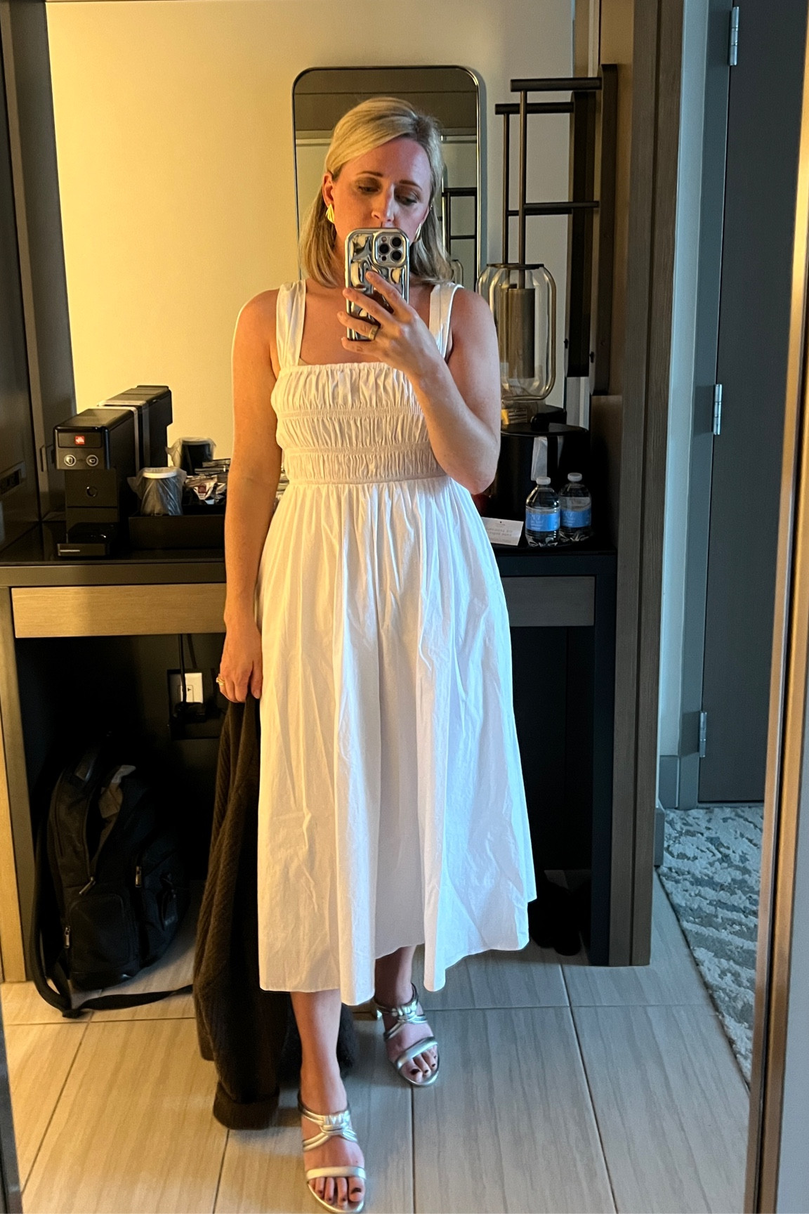 White dress, brown cashmere cardigan, silver block heels, heaven mayhem earrings, silver Amazon phone case, hair bow

#LTKfindsunder50 #LTKVideo #LTKsalealert