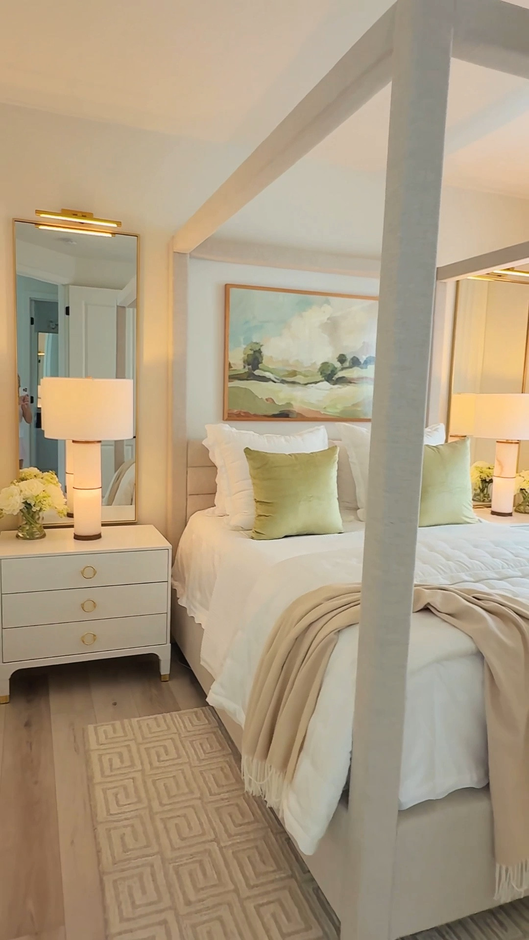 A few ways I make small bedrooms feel bigger:
	1.	Mirrors behind nightstands add light and depth ✨ Restoration Hardware uses this trick all the time and I love the look!
My mirror is 60” x 24”. I went a little larger since my nightstand is 30” wide. I could have all gone with a mirror that’s 30” wide. I’ve also linked a vanity mirror that can be hung vertically.
	2.	A cozy upholstered four poster bed creates a statement without overwhelming the space 🛌 The last hotel room we stayed in in Scotland did this and I fell in love with the warm, inviting feel.
My bed is a Queen size.
	3.	Hang drapes wide and high to make the ceilings feel taller and keep the window fully visible when open 🪟 Best trick I’ve learned from designers!
Window treatments are from @designs_by_tania. She’s amazing and local to SoCal if you’re looking for something custom.
	4.   And don’t forget a large piece of art or a gallery wall above the bed. It really opens up the space 🖼️ I always love a large visual piece to help set the mood.

#LTKHome #LTKSaleAlert