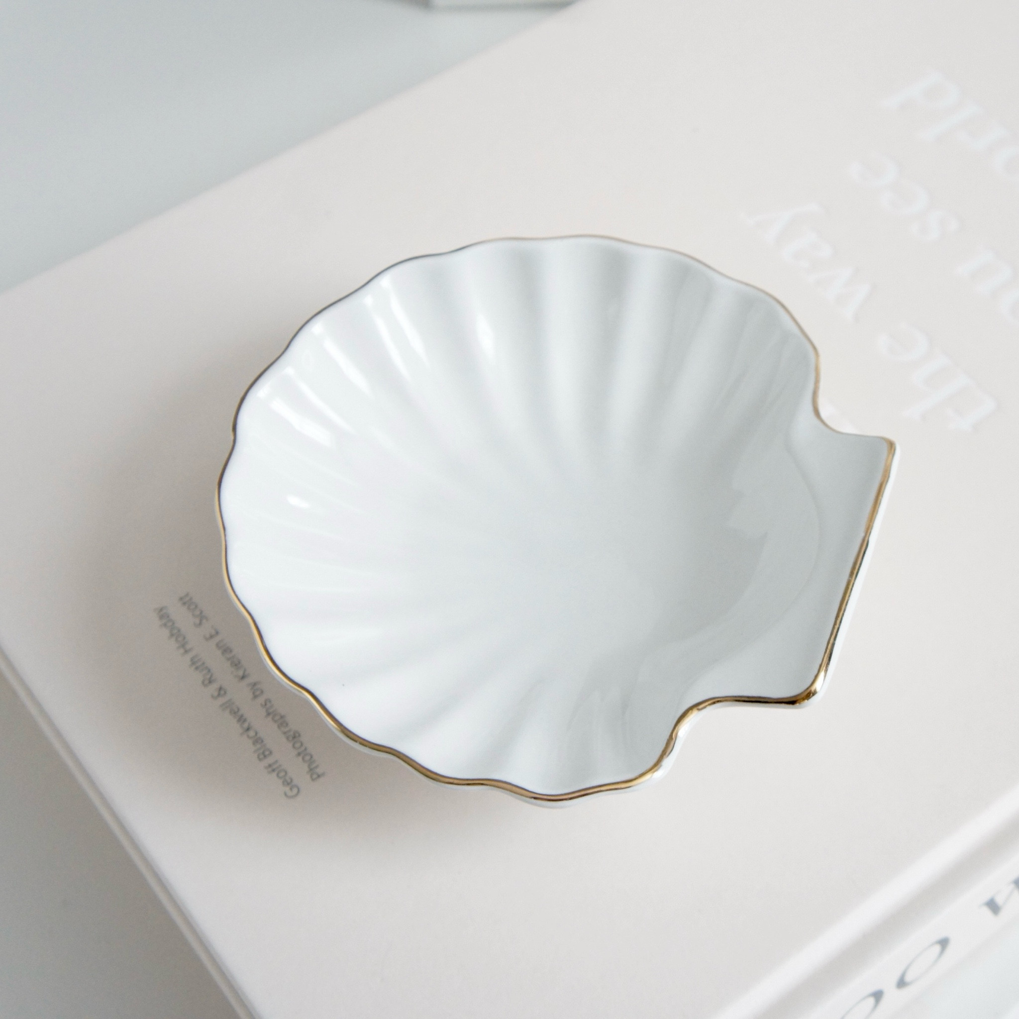 Vintage shell jewelry trinket dish 

#LTKMostLoved #LTKGiftGuide #LTKhome