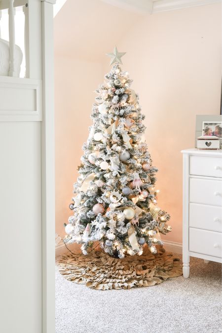 The pre-lit flocked tree in my daughter’s room has lovely pink and white ornaments. 

#LTKSeasonal #LTKhome #LTKHoliday