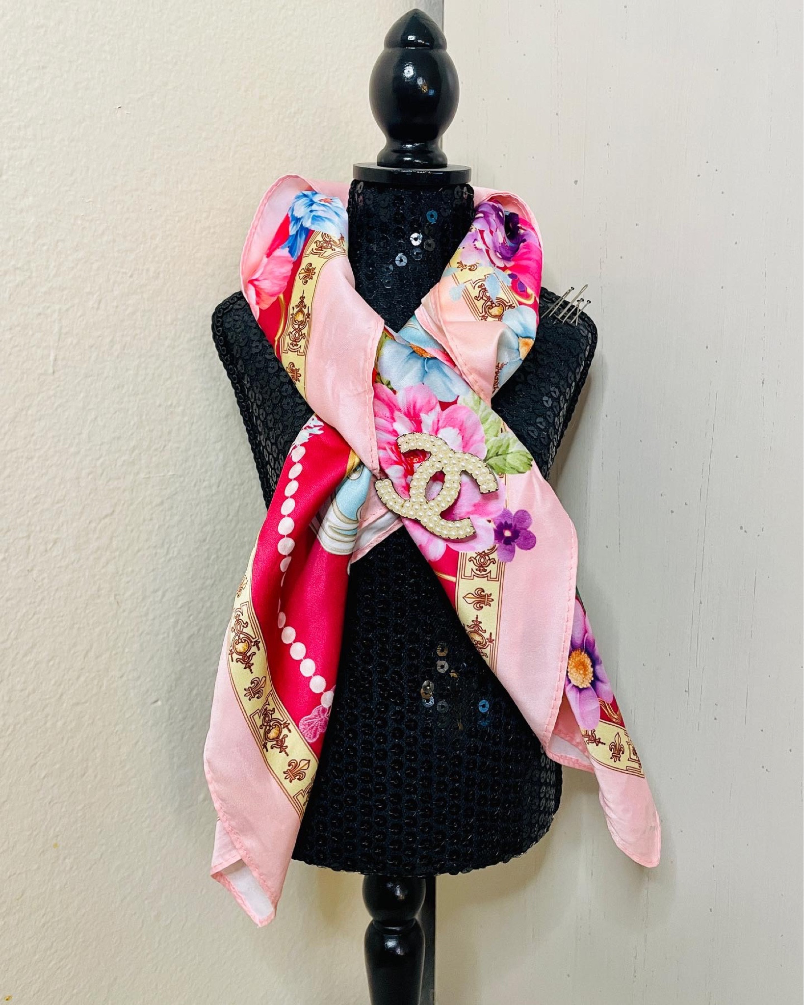 Take any scarf (silk or not) and add any brooch (designer or not) to it for an easy, upscale look! This scarf was under $50! Linked a silk and super affordable option  More ways to style your brooch on the blog :)

#LTKunder100 #LTKstyletip #LTKfit