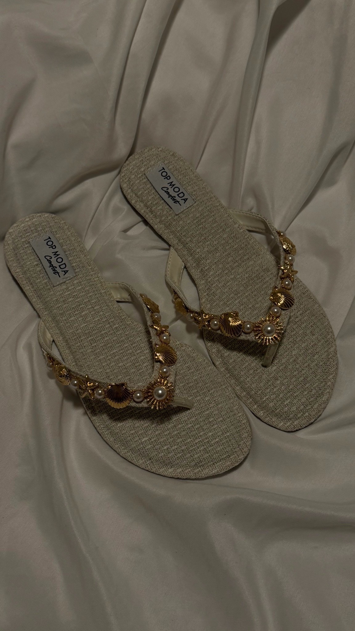 seashell charm flip flops under $30 

#LTKshoes

#LTKSeasonal #LTKSaleAlert