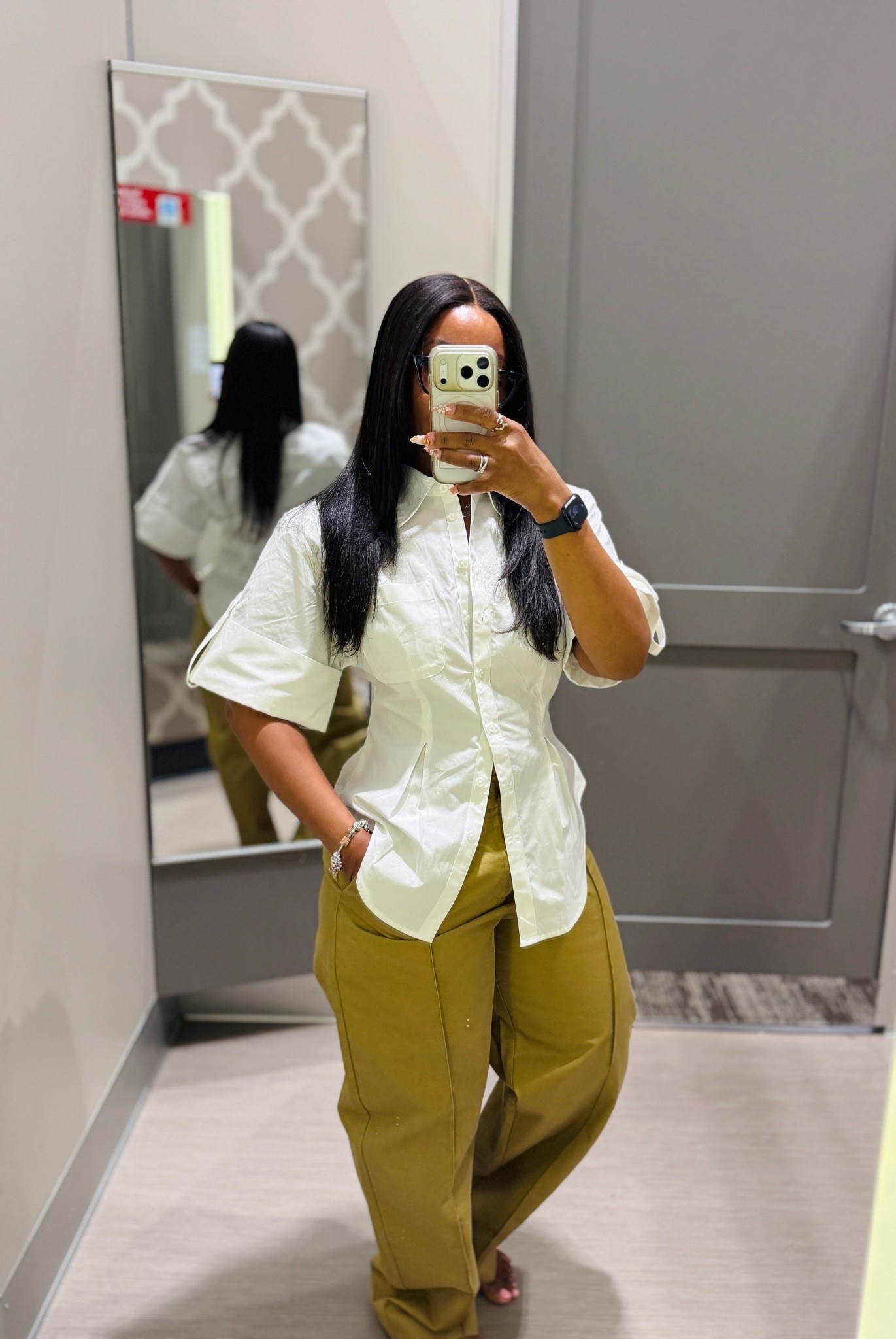 I love this look so much! I am wearing a size small in the top and it fits so good. Love the cinch waist and the shoulders are padded but not too much. The last two buttons don’t actually work on the shirt just fyi, does come in a striped color option. Love the wide sleeve and how it comes down the cover my arms.

Pants are a small and go so well with this shirt.

#LTKU #LTKPetite #LTKootd
