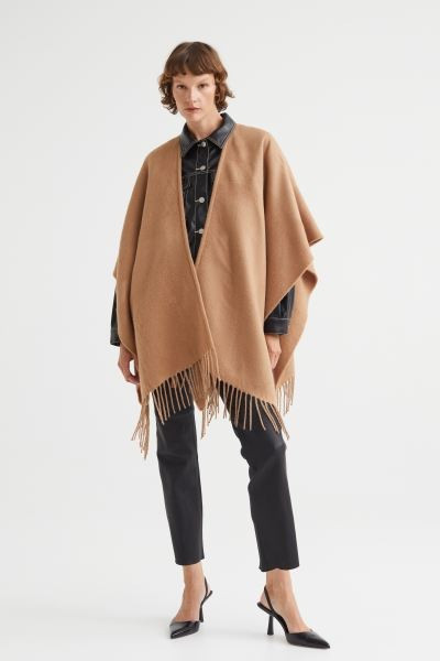Poncho con bajo desflecado | H&M (FR, IT, ES, PT, BE)