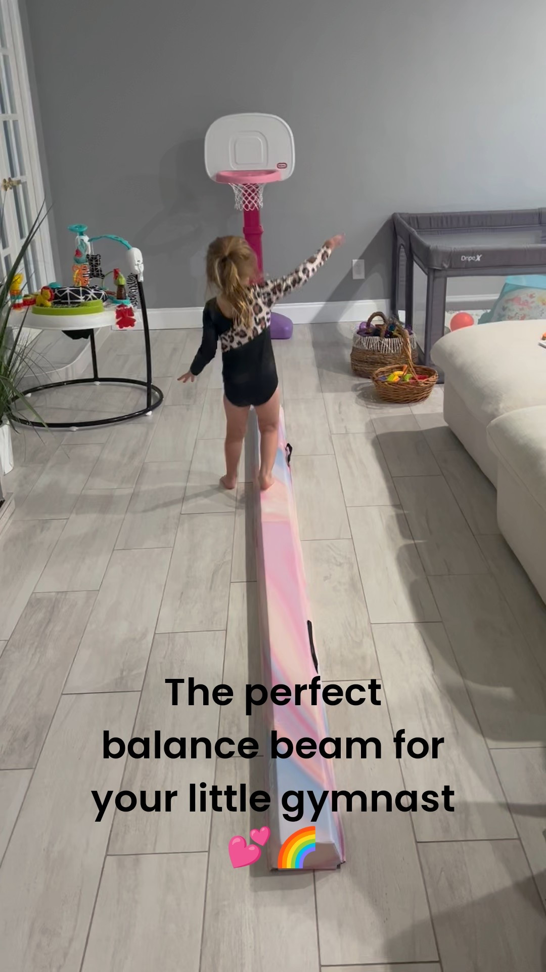 This foldable pastel rainbow balance beam is a game-changer — soft but sturdy, wipeable (not that suede material most others have 🙌), and easy to store. Finley’s obsessed and honestly… I am too 😍

Also linked her favorite leotards + some of our go-to living room toys for indoor play days 🩰✨

#LTKHome #LTKKids #LTKActive