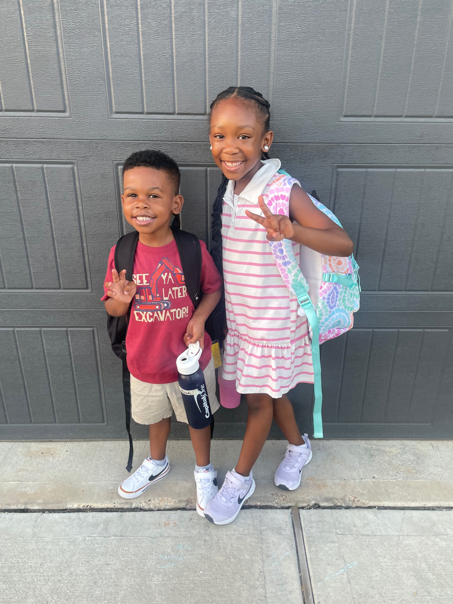 Micah and Rylie are ready to take on the school year in style! Micah rocks a cool excavator-themed tee with comfy shorts and sneakers, while Rylie shines in a sweet striped dress paired with sneakers and a fun backpack. These siblings are all set for a great start to the new school year. 

#BackToSchool #KidsFashion #SiblingStyle #FirstDayOfSchool #MomLife #CuteKidsOutfits #SchoolStyle #BackToSchoolFashion #FamilyMoments

#LTKStyleTip #LTKBacktoSchool #LTKKids