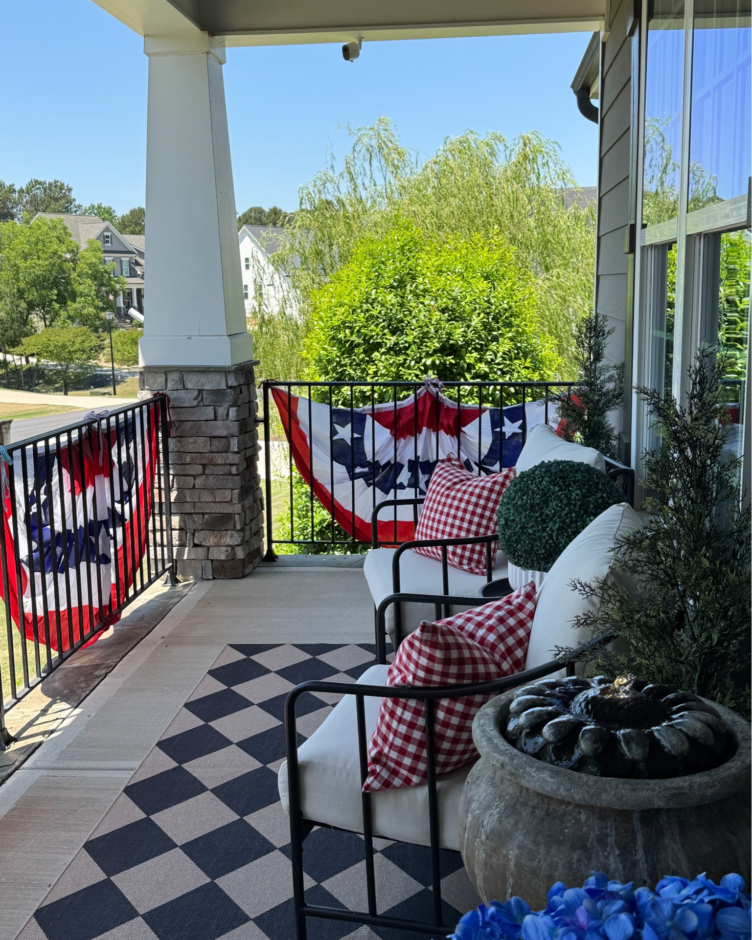 Red, white and blue♥️🤍💙 My patriotic porch is ready for the 4th of July.

Hydrangeas, red and white gingham pillow covers, pillow inserts, 3 piece conversation set, outdoor rug, red, white & blue bunting flags, topiary balls, faux cedar trees