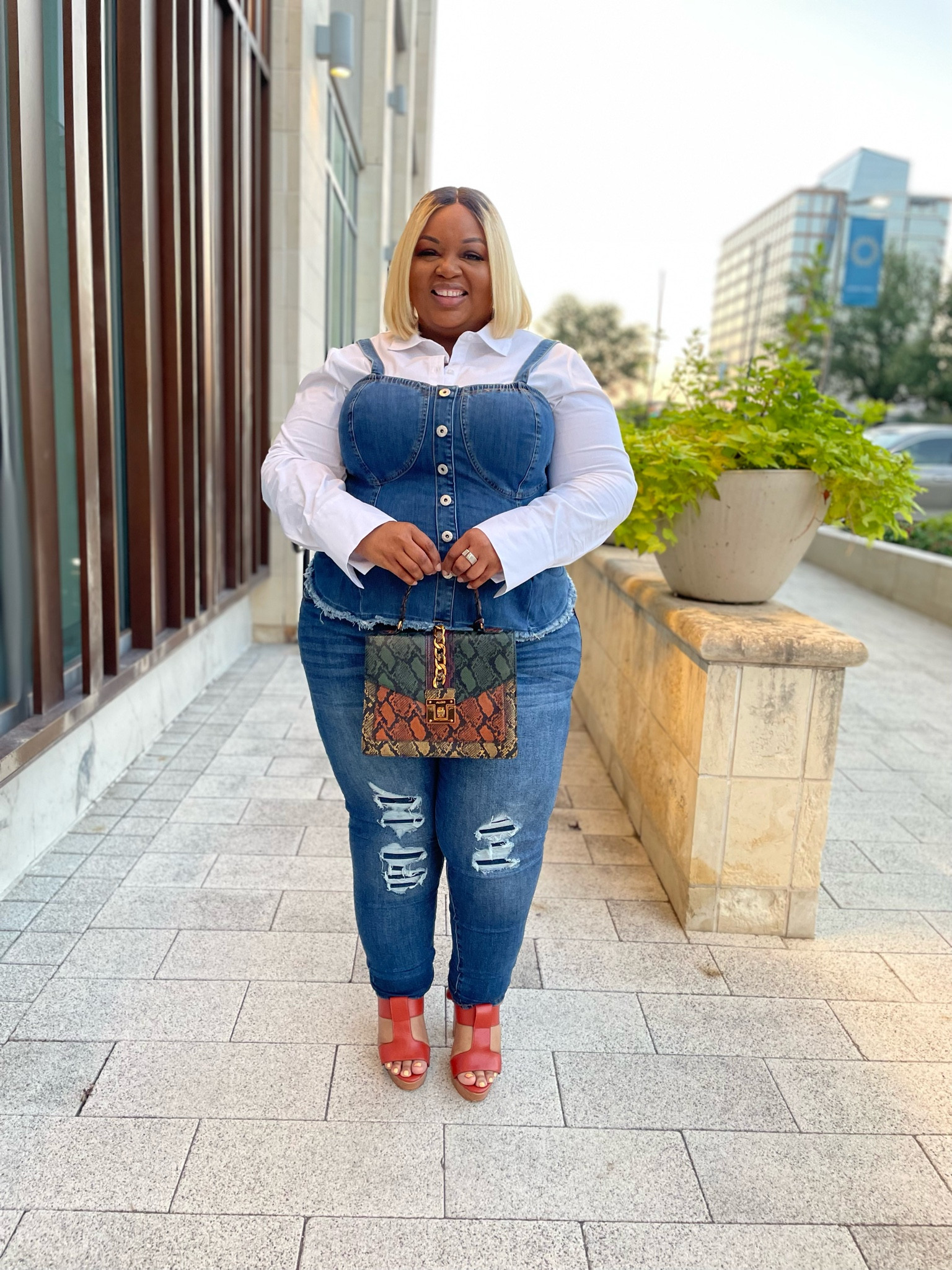 Sexy plus size denim corset and plus size jeans. #LTKplussize #LTKcurvy