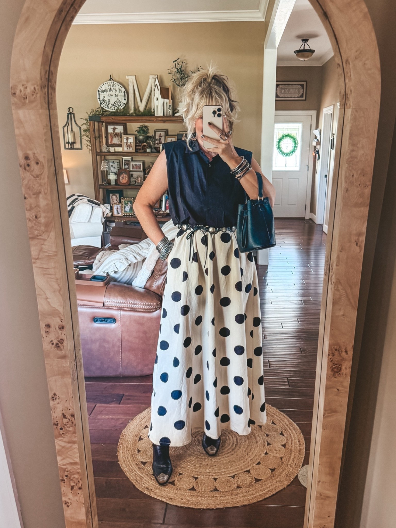This polka dot dress is the best! Love it layered and it’s perfect with this cinched waist top and belt! 
I’m wearing a medium in both 
True size in these boots

#LTKgrwm #LTKootd #LTKOver40