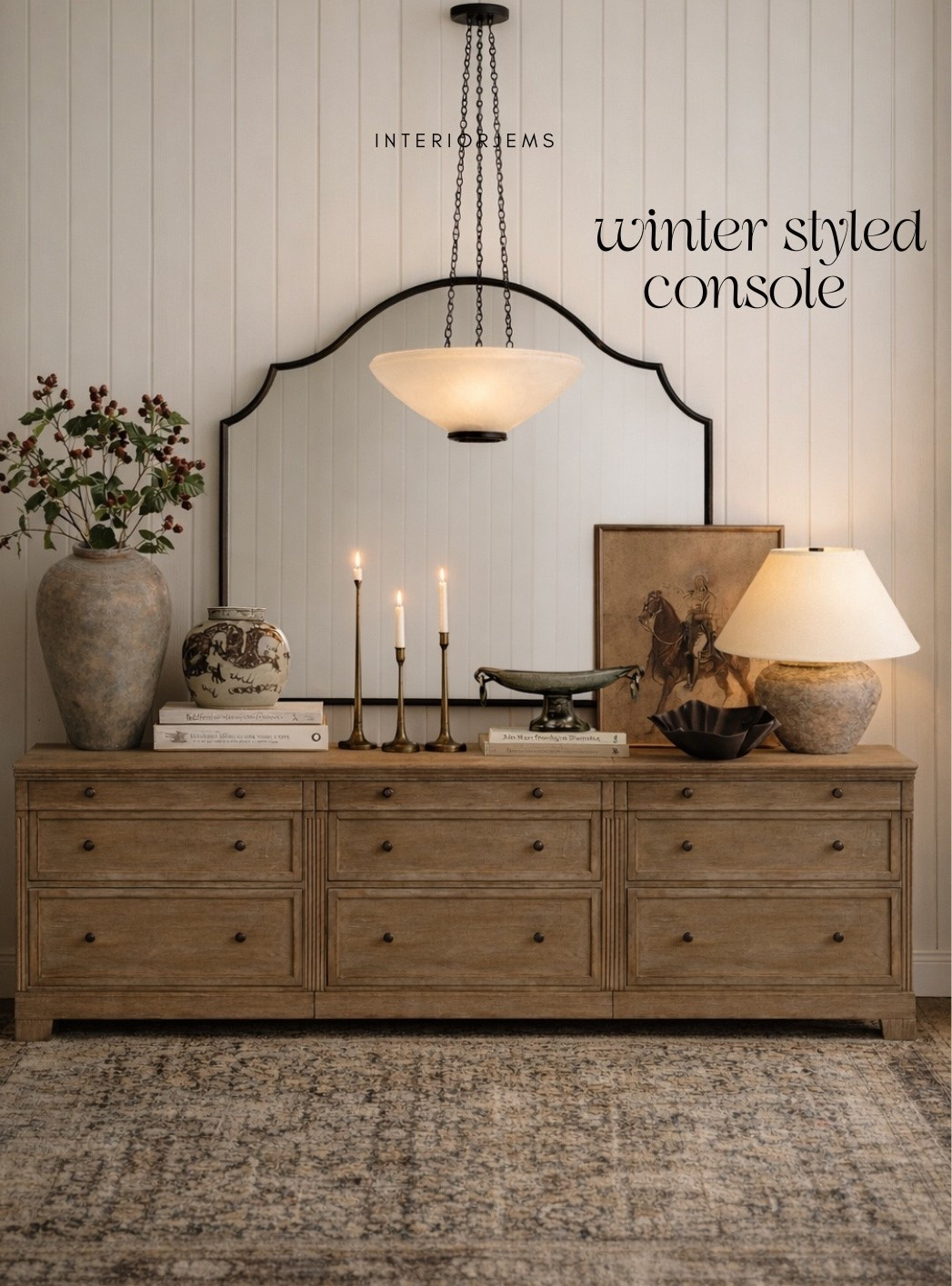 Winter refresh extra large console Styling, splurge, and save edition, my go to lamp. It just works anywhere. This oversize mirror from Home Depot is absolutely incredible. Love this new pendant light. The stems are on clearance from Crate & Barrel. The candlesticks are for magnolia love the brown floral, ginger jar, and the silver bowl is right on trend Entryway Styling, living room, Styling.

#LTKHome #LTKSaleAlert #LTKGiftGuide