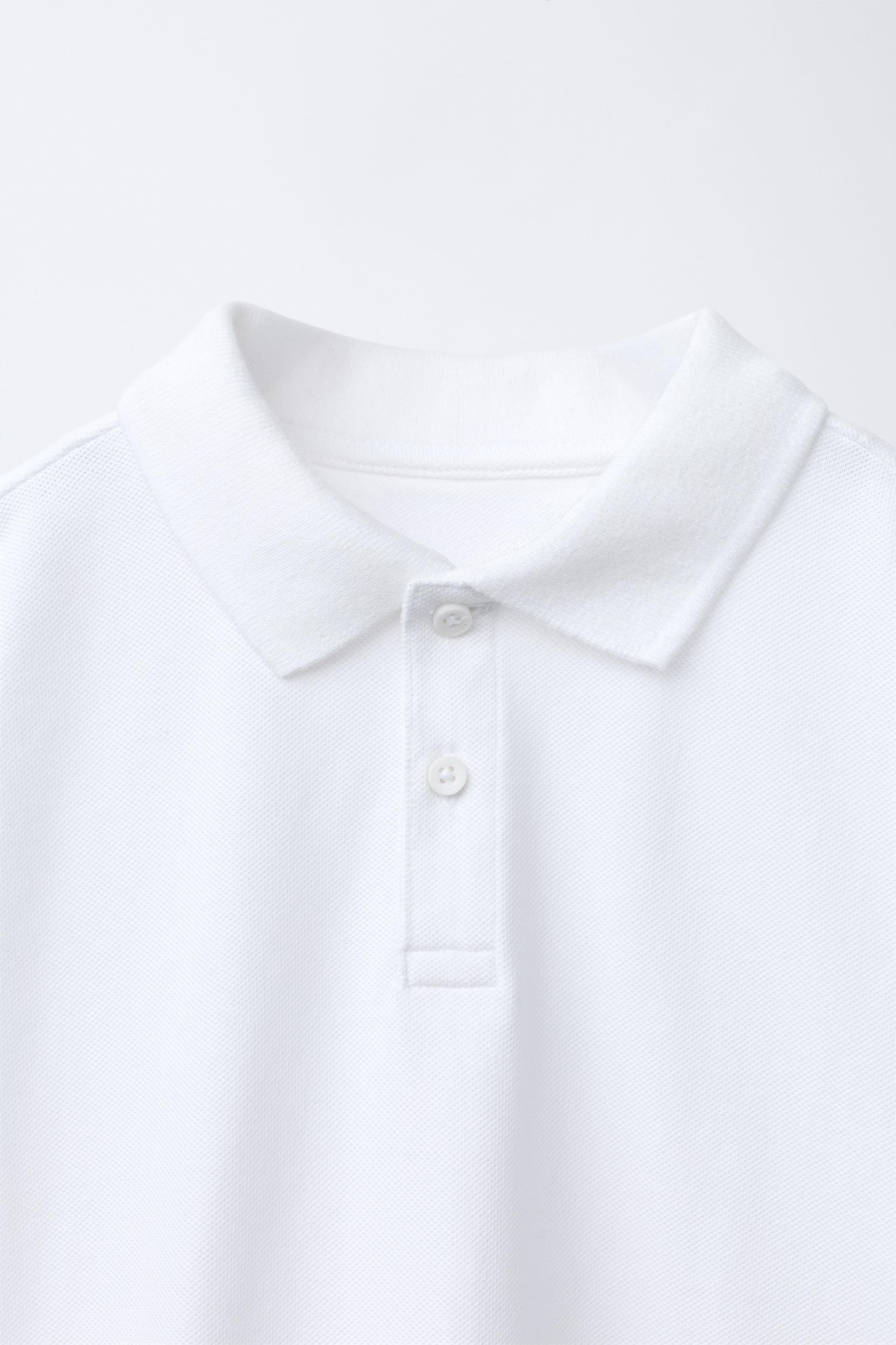 Basic polo shirt with collar and short sleeves. Button closure at yoke. | Zara US
