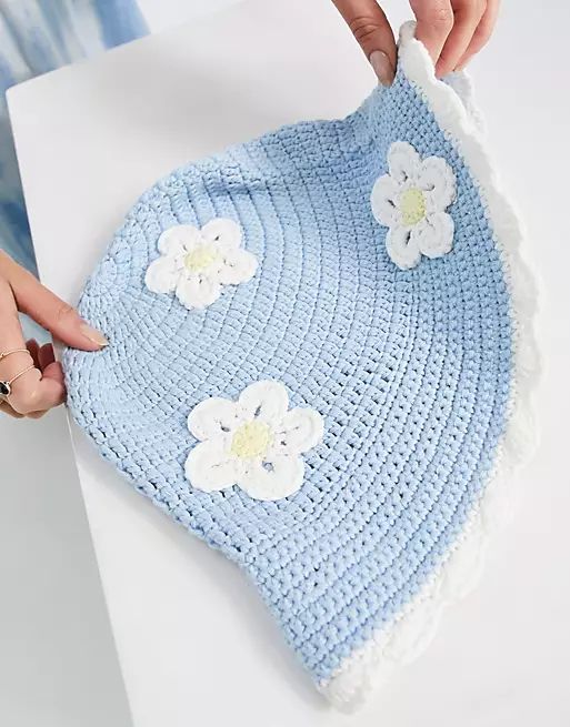 ASOS DESIGN crochet bucket hat with daisy embroidery in blue | ASOS (Global)