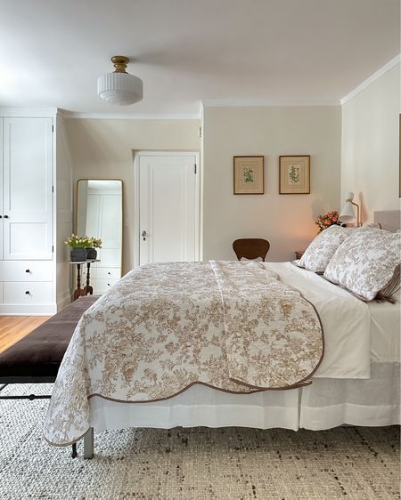 Bedroom details. Just saw that my garden quilt + shams are NOW 70% off!  Quilt is originally $200 but now $60 with the Power Penney Deal! *spring bedroom, bedskirt, flush mount lighting, iron bench, rug, bed sheets, cabinet hardware, sconces, faux tulips, vase

#LTKsalealert #LTKhome