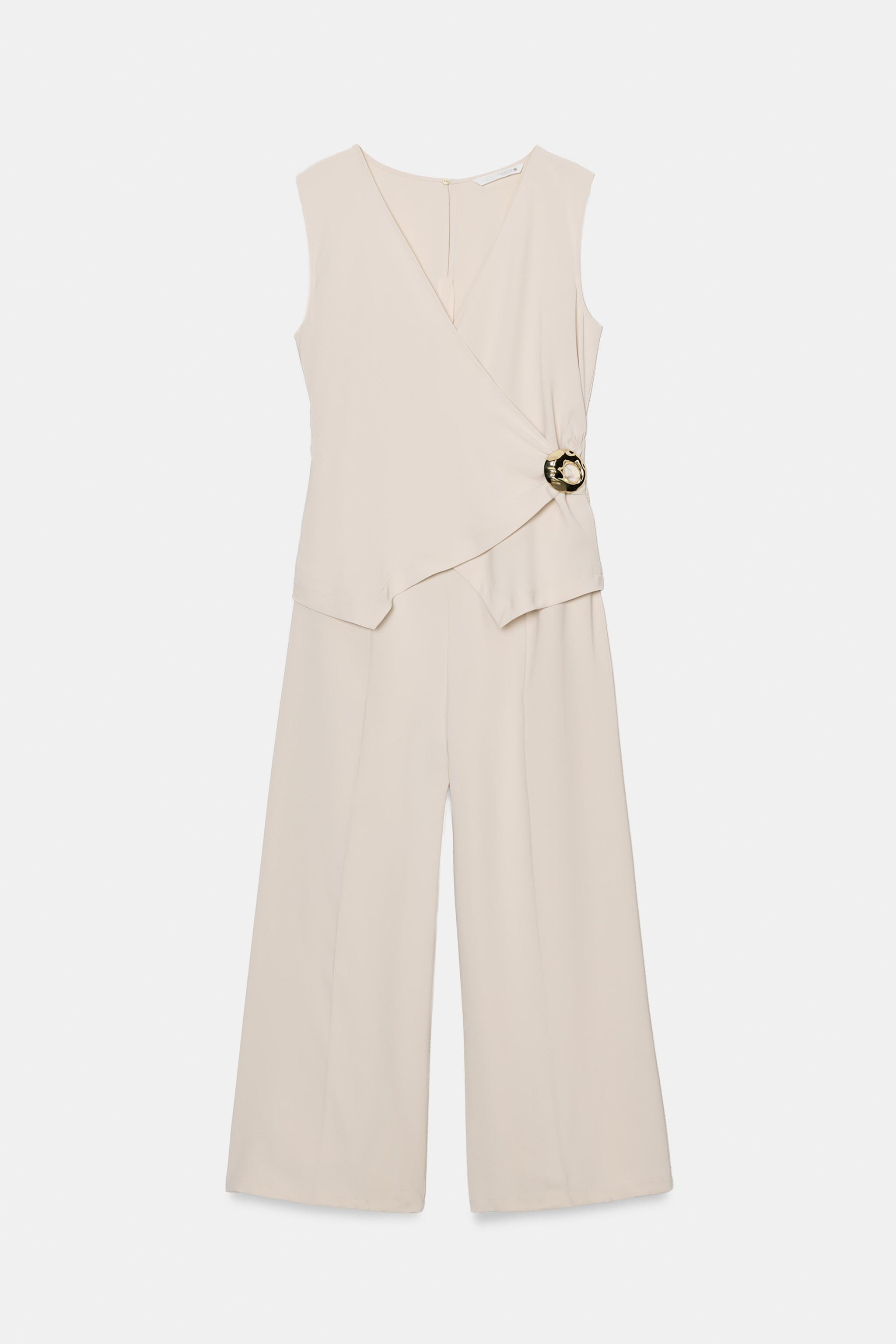 JUMPSUIT MET GOUDEN APPLICATIE | Zara US