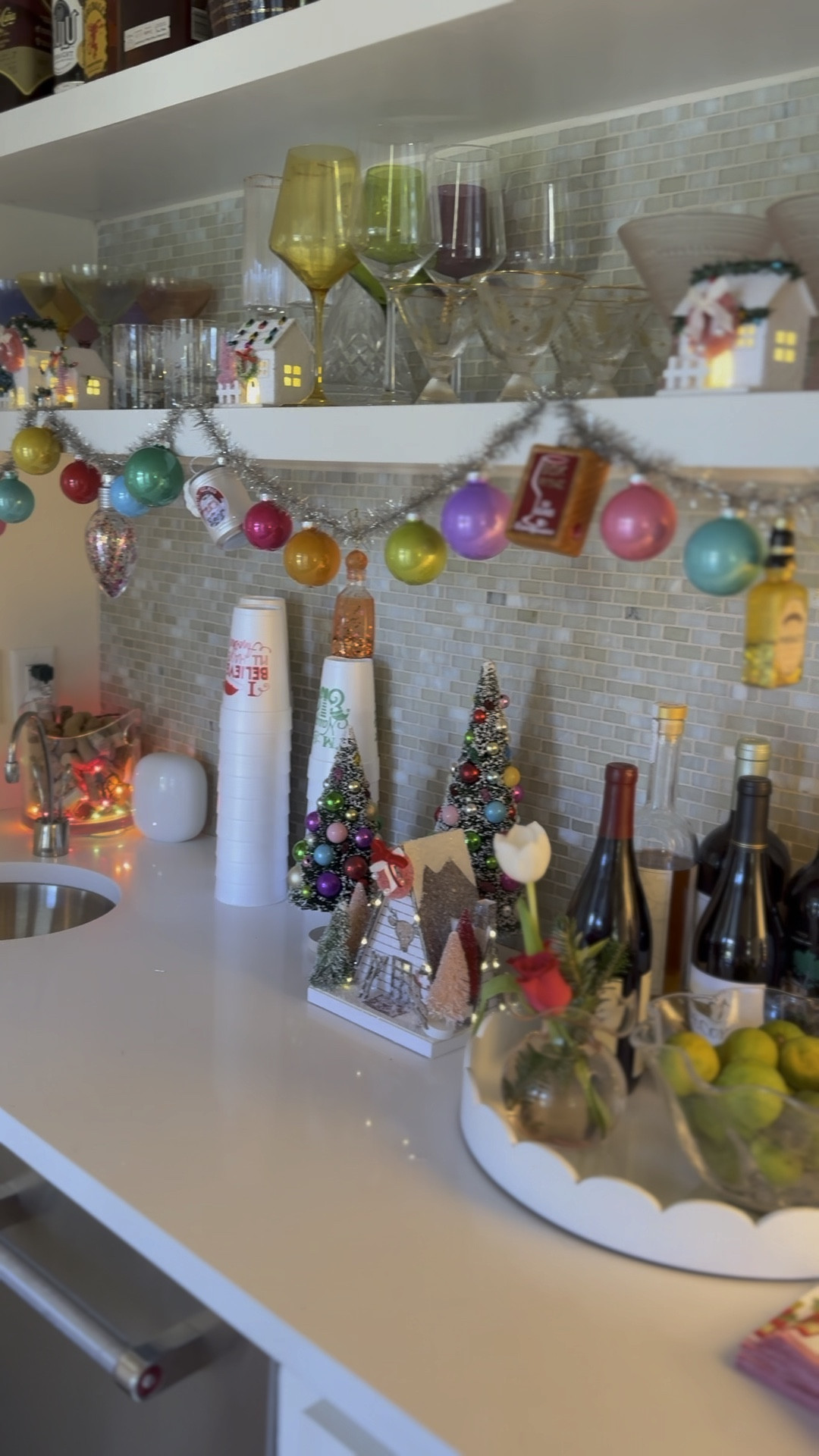 christmas bar garland 🥳🍾🎄 the light bulb ornaments i can’t find but got at walmart for $.98 each!! 

#LTKHome #LTKHoliday #LTKSeasonal