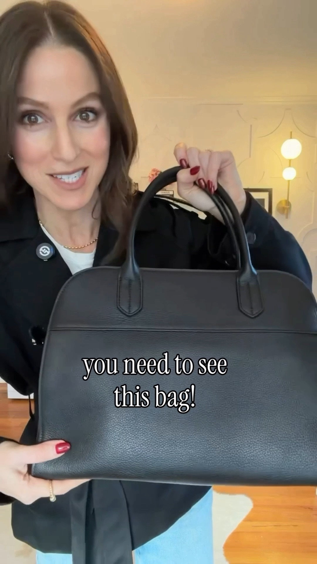 This bag - the hottest shape this season. Looks like The Row Margaux, also similar to the Jacquemus Bowling Bag — but instead of spending thousands - it’s under $200!!! You’ll be so impressed with the quality and it looks like a million bucks. Fits your laptop and perfect for travel and every day! Linked below and also linked the rest of my outfit! Great staples. True to size.